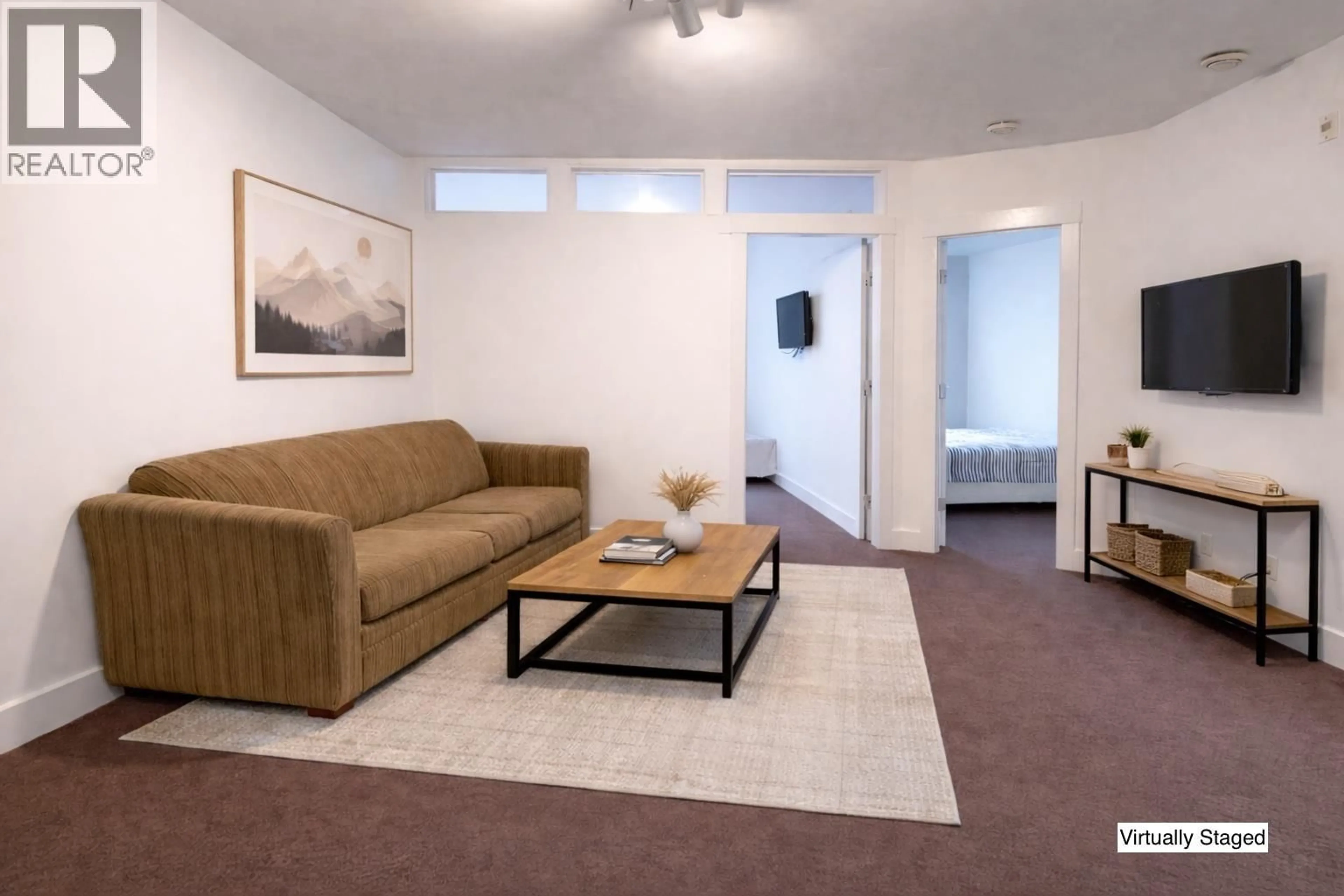 Living room with furniture, carpet floor for 302 - 7330 ARBUTUS STREET, Pemberton British Columbia V0N2L1