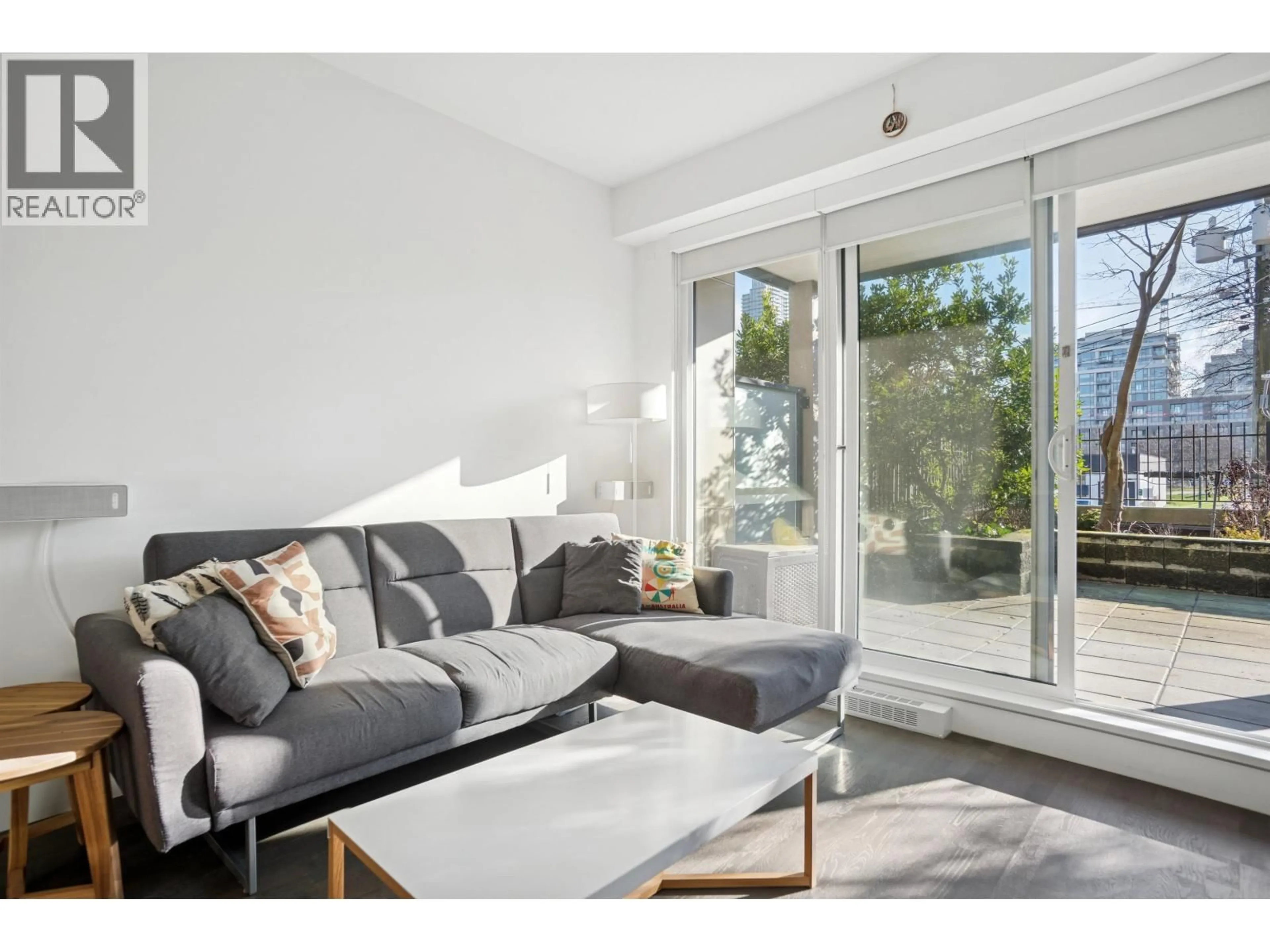 Living room with furniture, wood/laminate floor for 209 - 1628 4TH AVENUE, Vancouver British Columbia V6J0G6