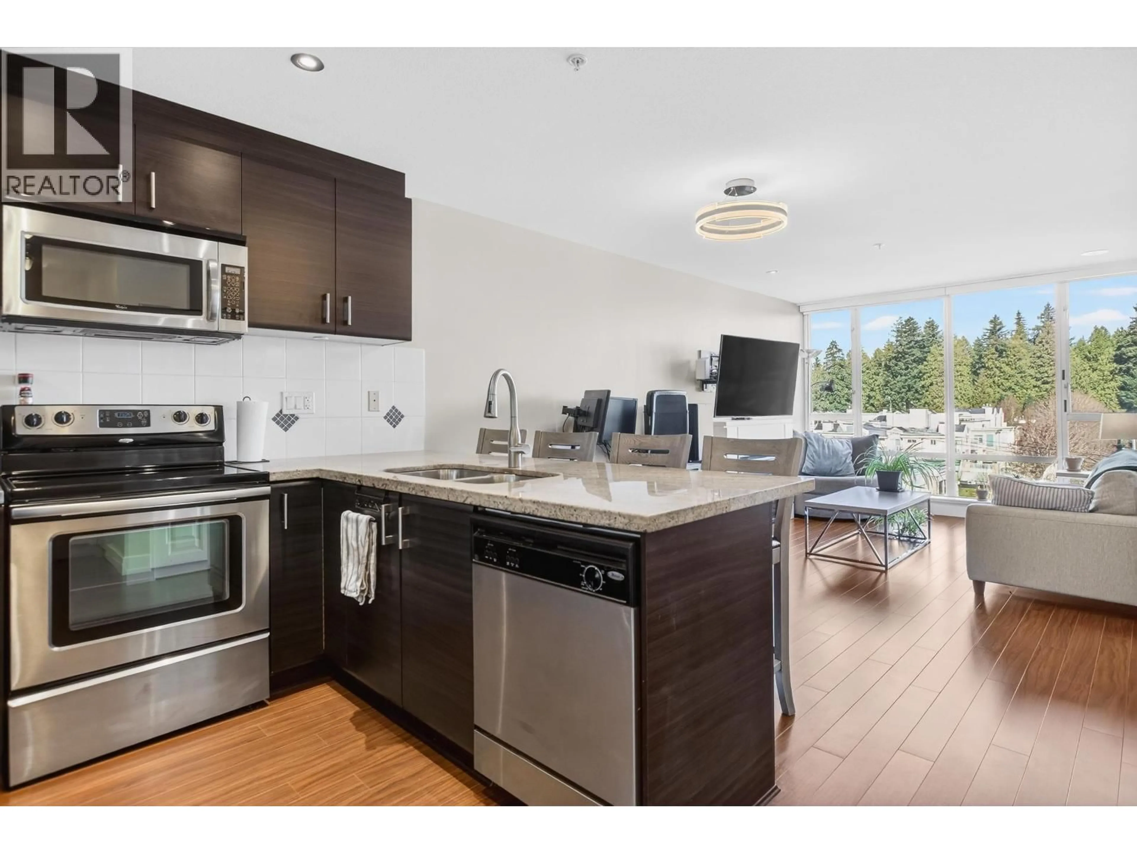 Open concept kitchen, wood/laminate floor for 502 - 12069 HARRIS ROAD, Pitt Meadows British Columbia V3Y0C8