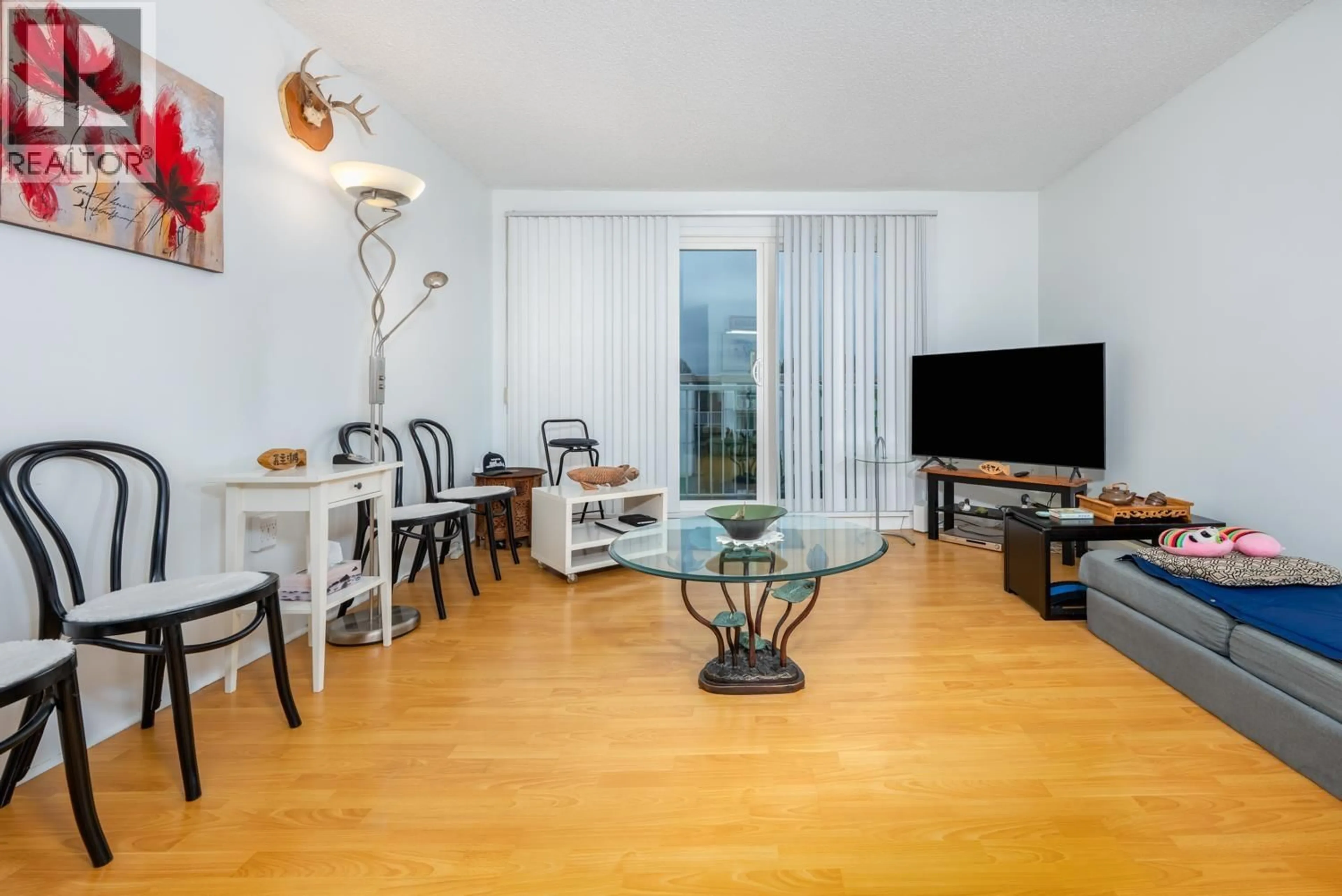 Living room with furniture, wood/laminate floor for 310 - 7240 LINDSAY ROAD, Richmond British Columbia V7C3M6