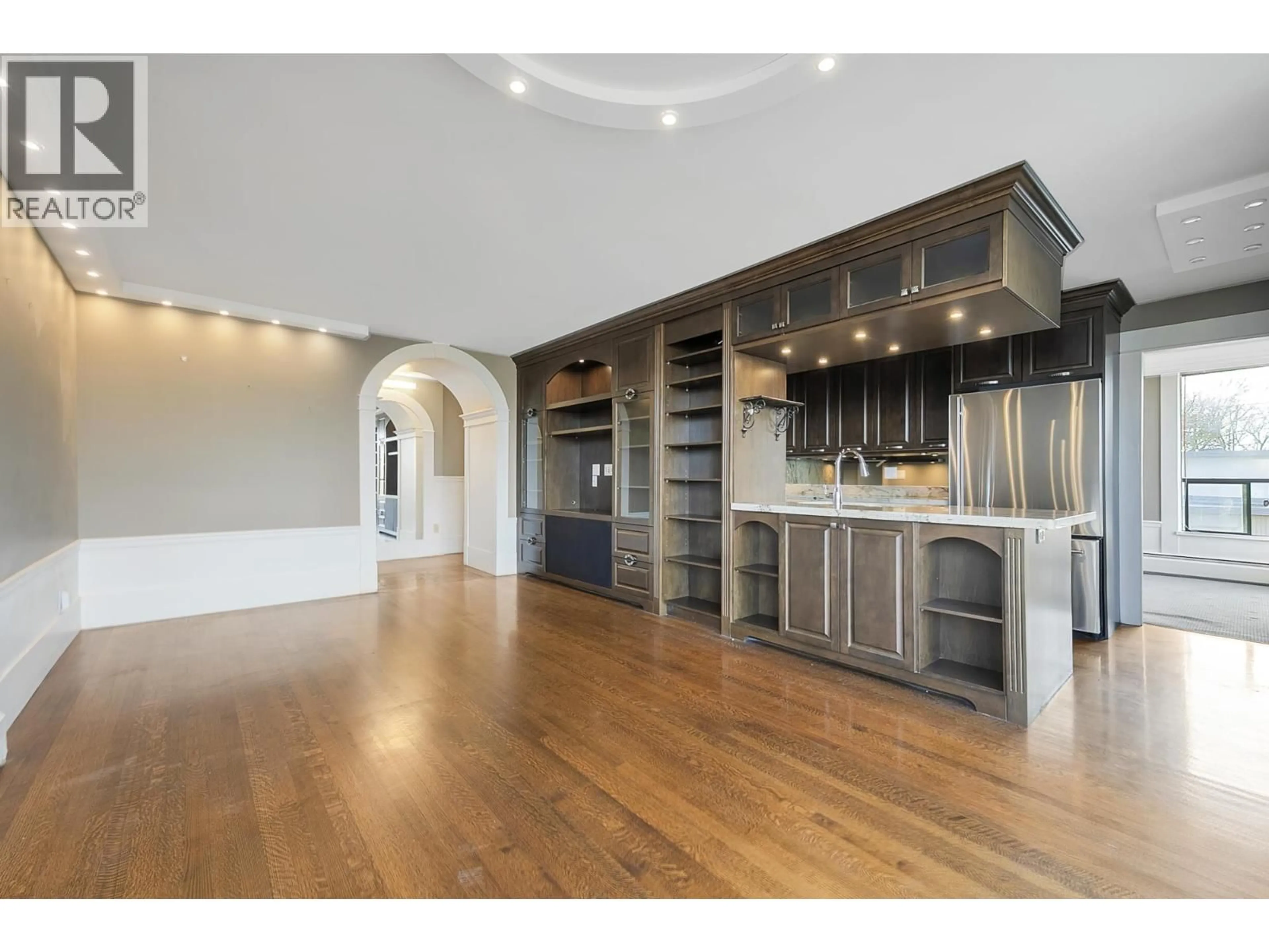 Open concept kitchen, wood/laminate floor for 501 - 2370 2ND AVENUE, Vancouver British Columbia V6K1J2