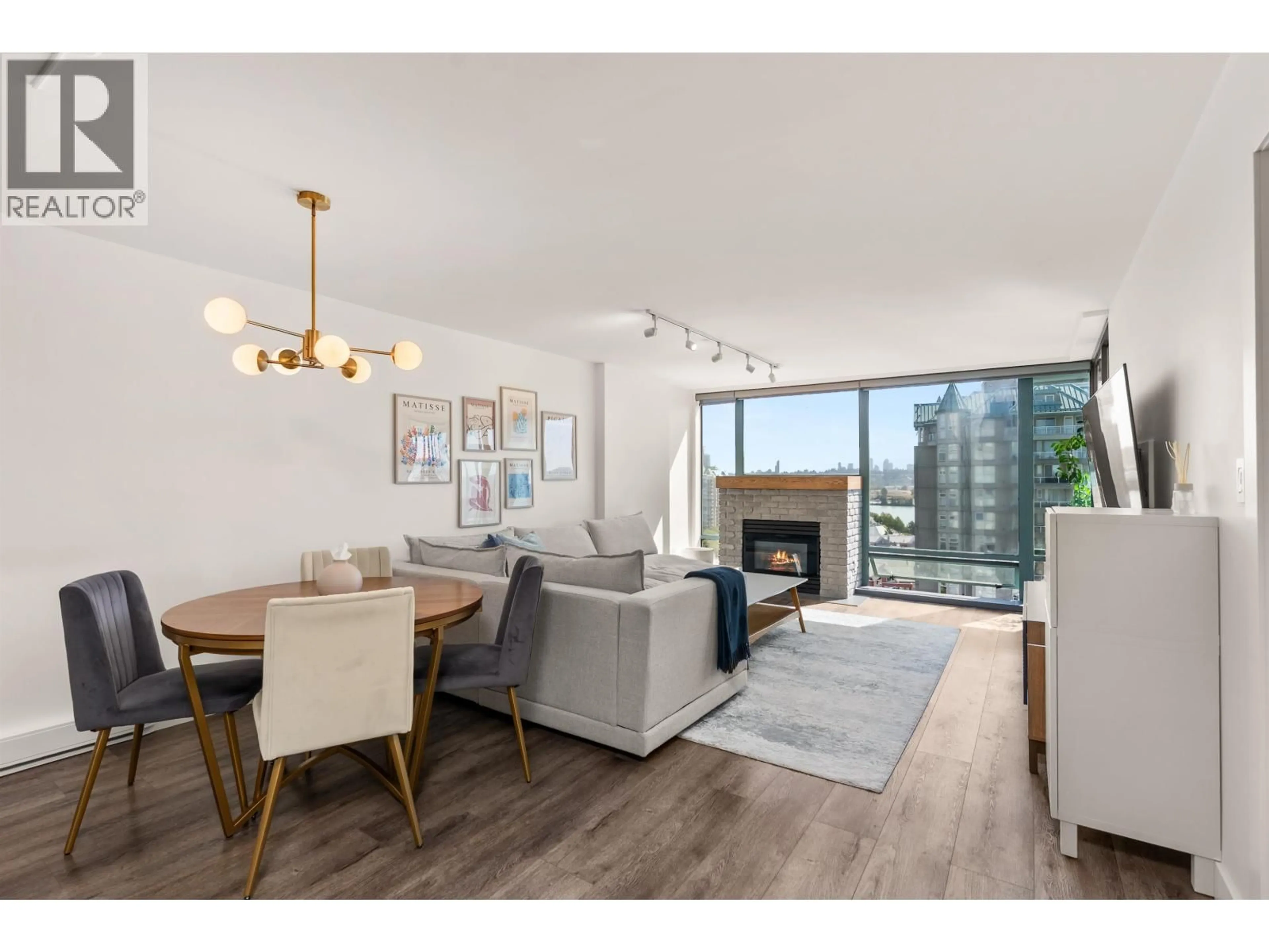 Living room with furniture, wood/laminate floor for 1602 - 8 LAGUNA COURT, New Westminster British Columbia V3M6M6