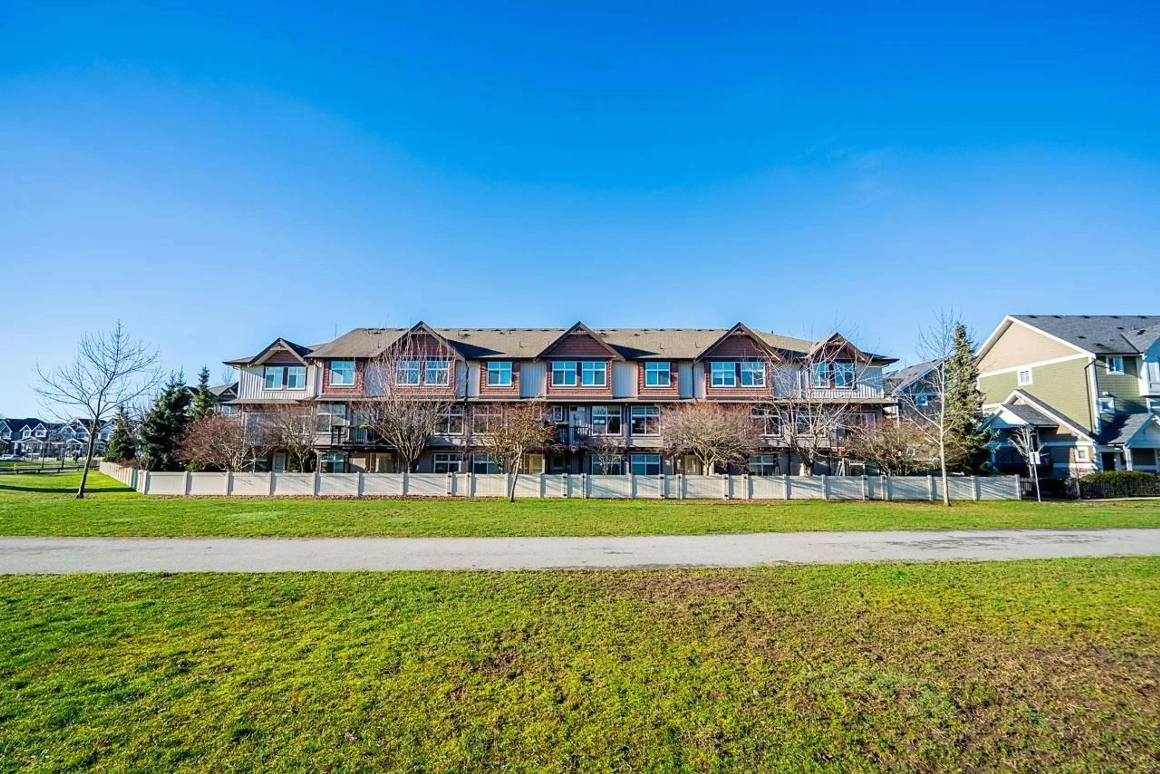 A pic from outside/outdoor area/front of a property/back of a property/a pic from drone, water/lake/river/ocean view for 28 - 7332 194A STREET, Surrey British Columbia V4N6K9