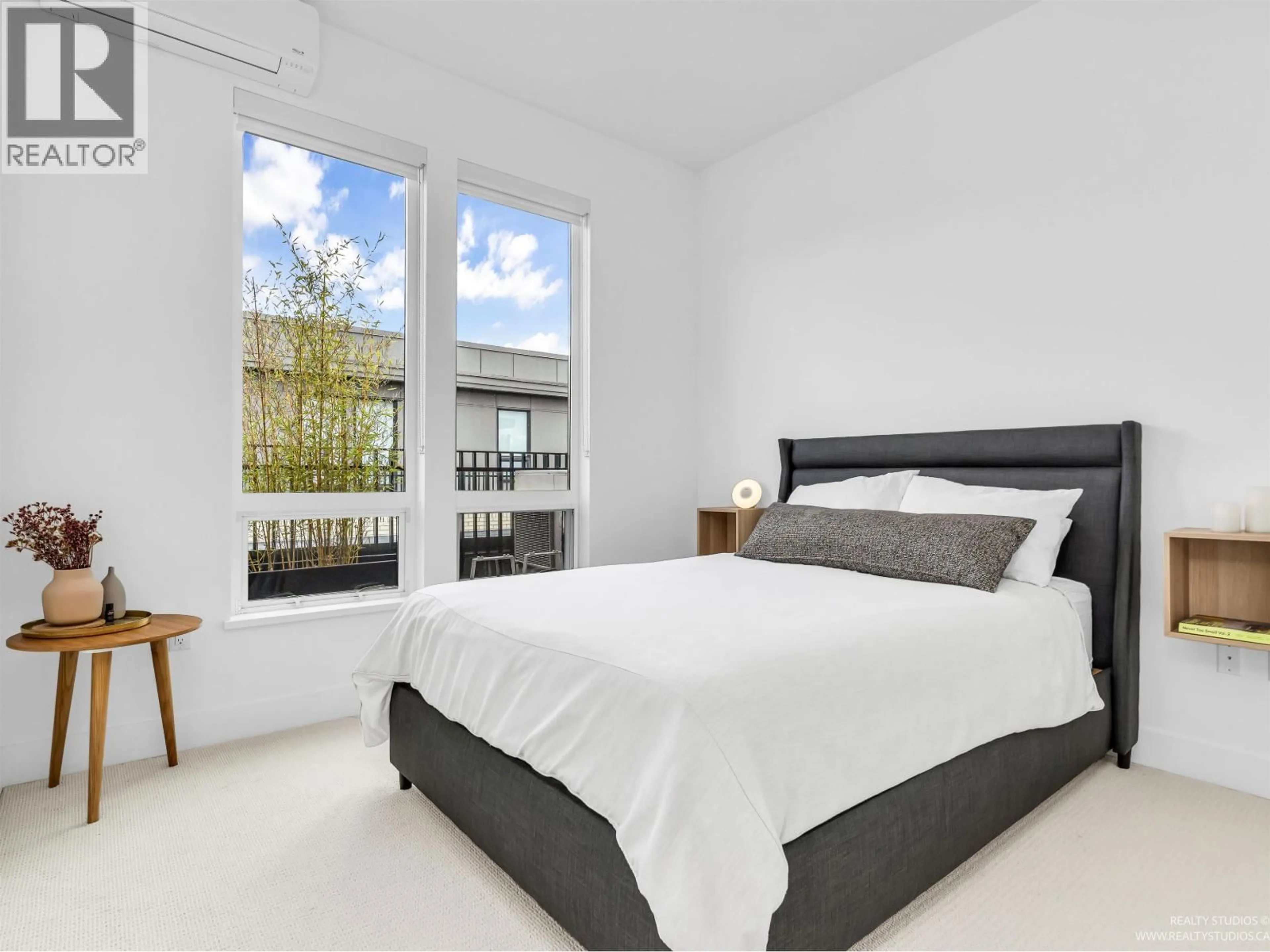Bedroom with bed, unknown for 405 - 288 KING EDWARD AVENUE, Vancouver British Columbia V5Y2J2