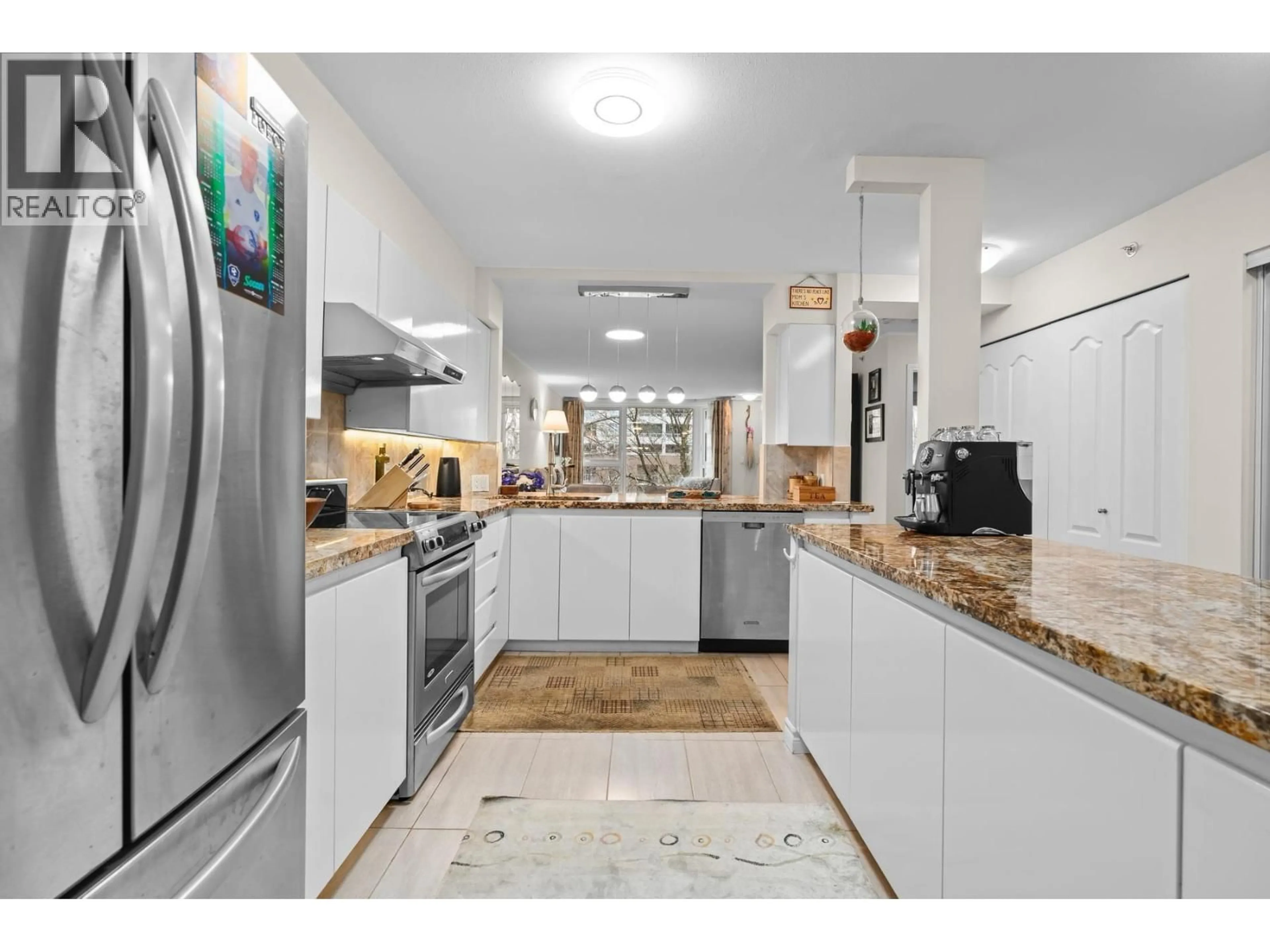 Open concept kitchen, ceramic/tile floor for 303 - 1488 HORNBY STREET, Vancouver British Columbia V6Z1X3