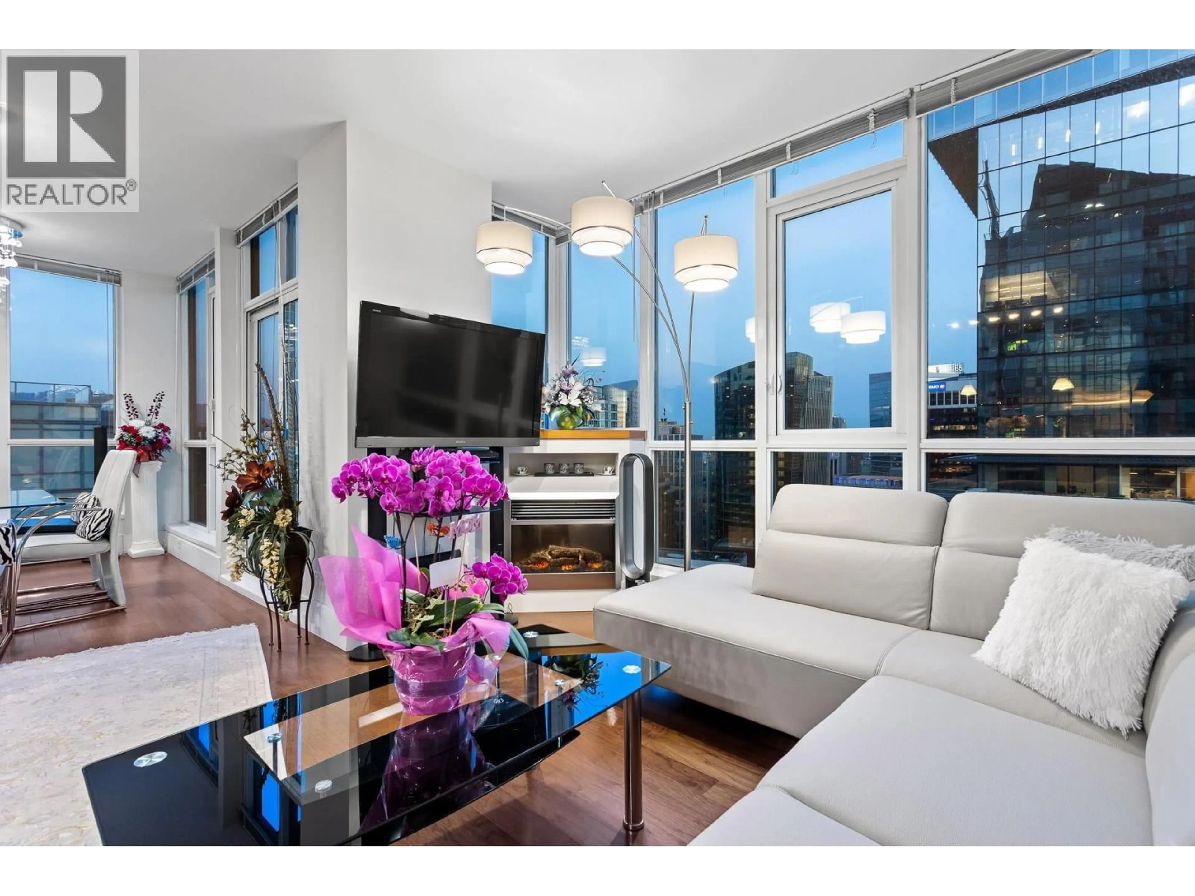 Living room with furniture, unknown for 3303 - 1189 MELVILLE STREET, Vancouver British Columbia V6E4T8