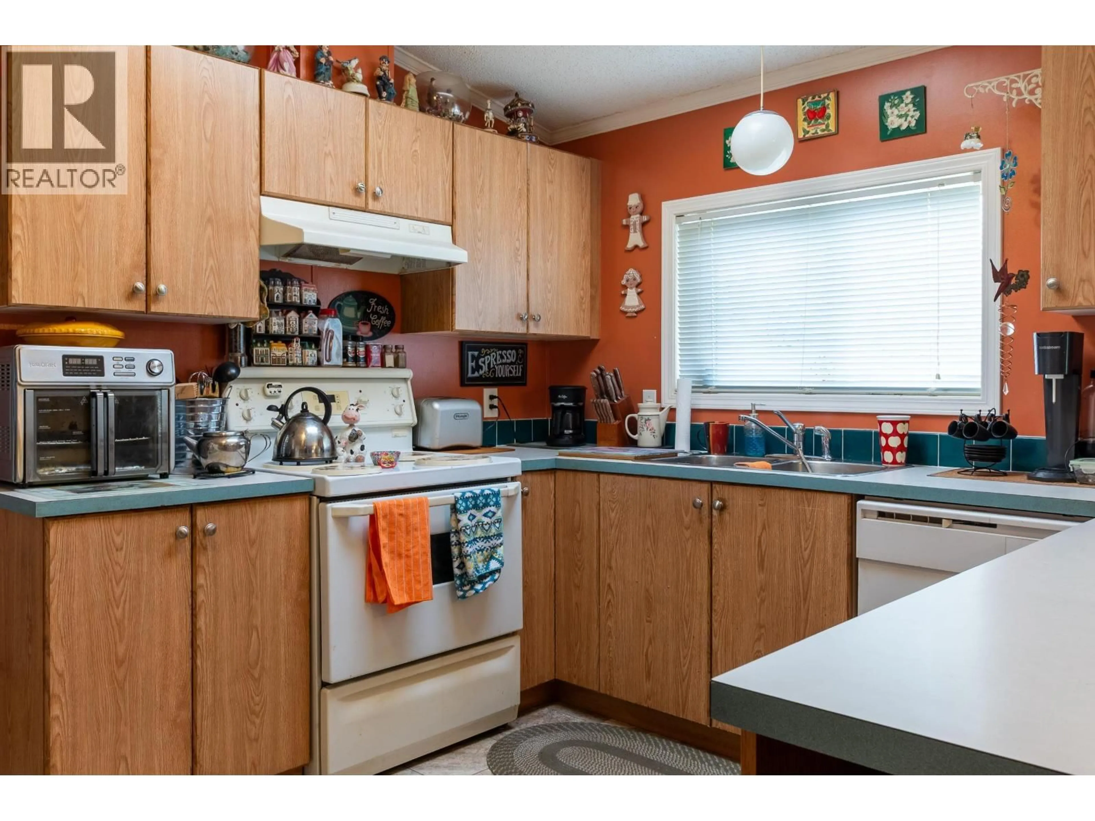Standard kitchen, wood/laminate floor for 67 - 7100 ALDEEN ROAD, Prince George British Columbia V2N5R5