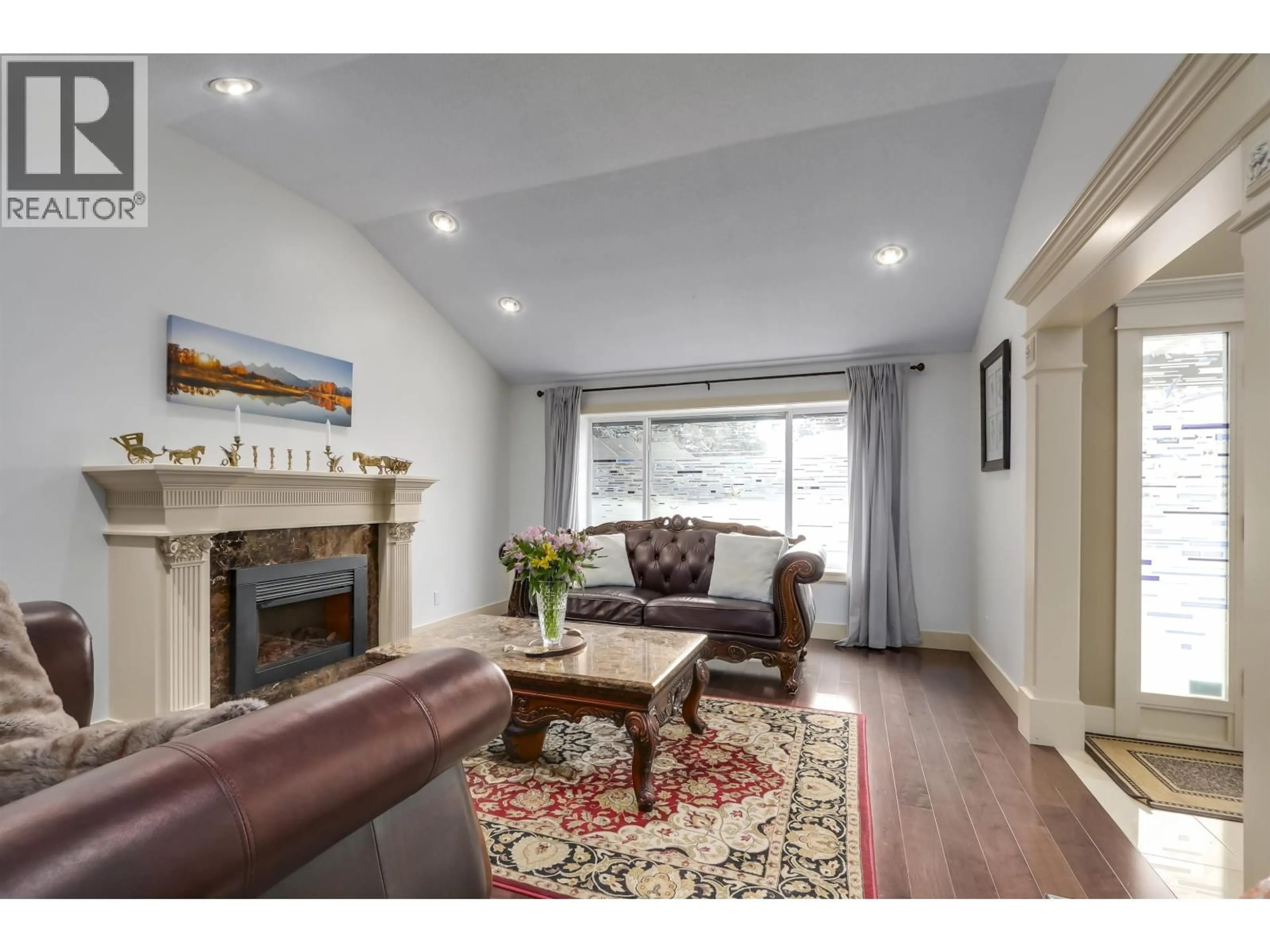 Living room with furniture, wood/laminate floor for 7680 CHEVIOT PLACE, Richmond British Columbia V7C3S6