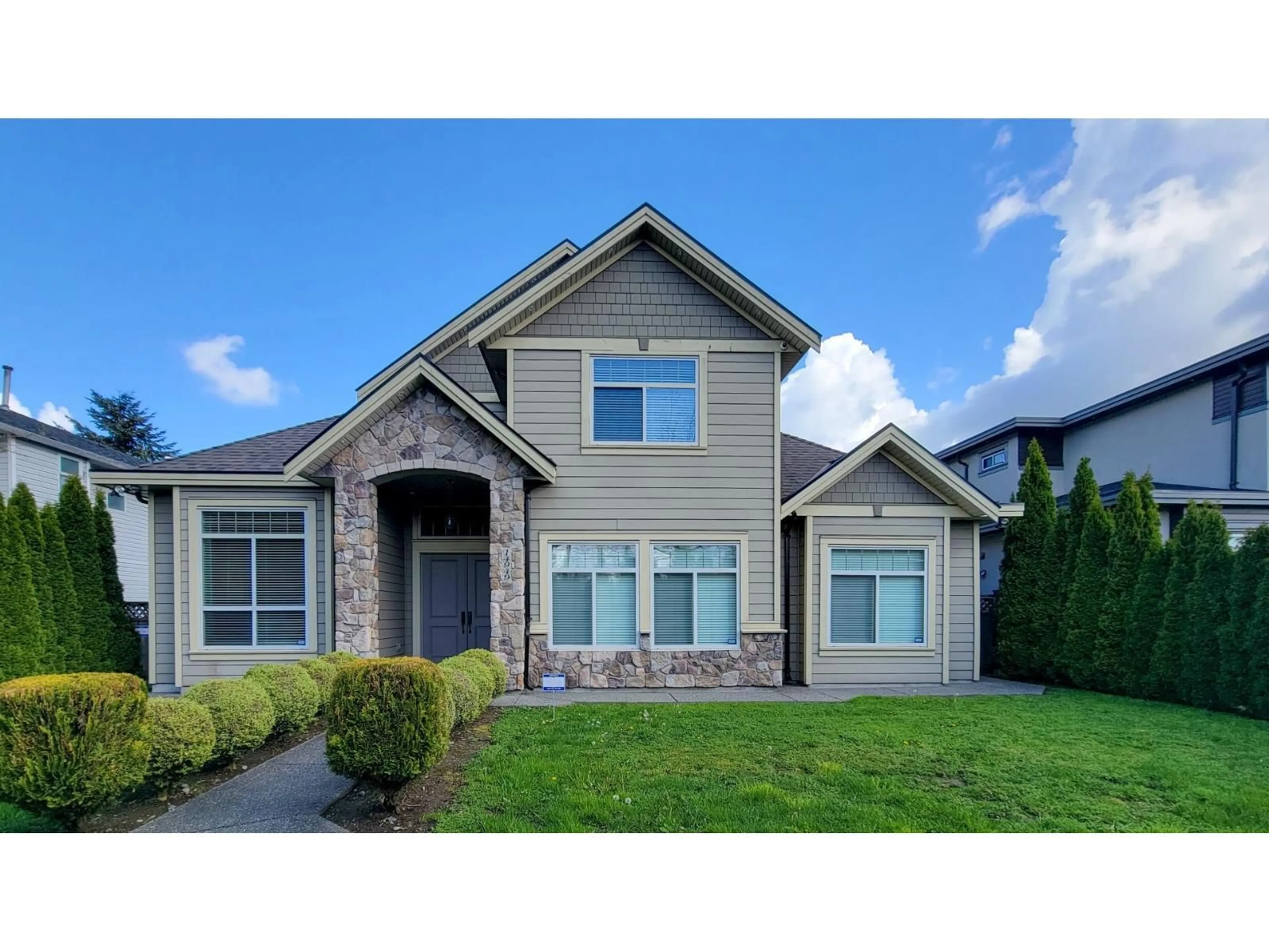 Home with vinyl exterior material, street for 14949 96 AVENUE, Surrey British Columbia V3R1E8