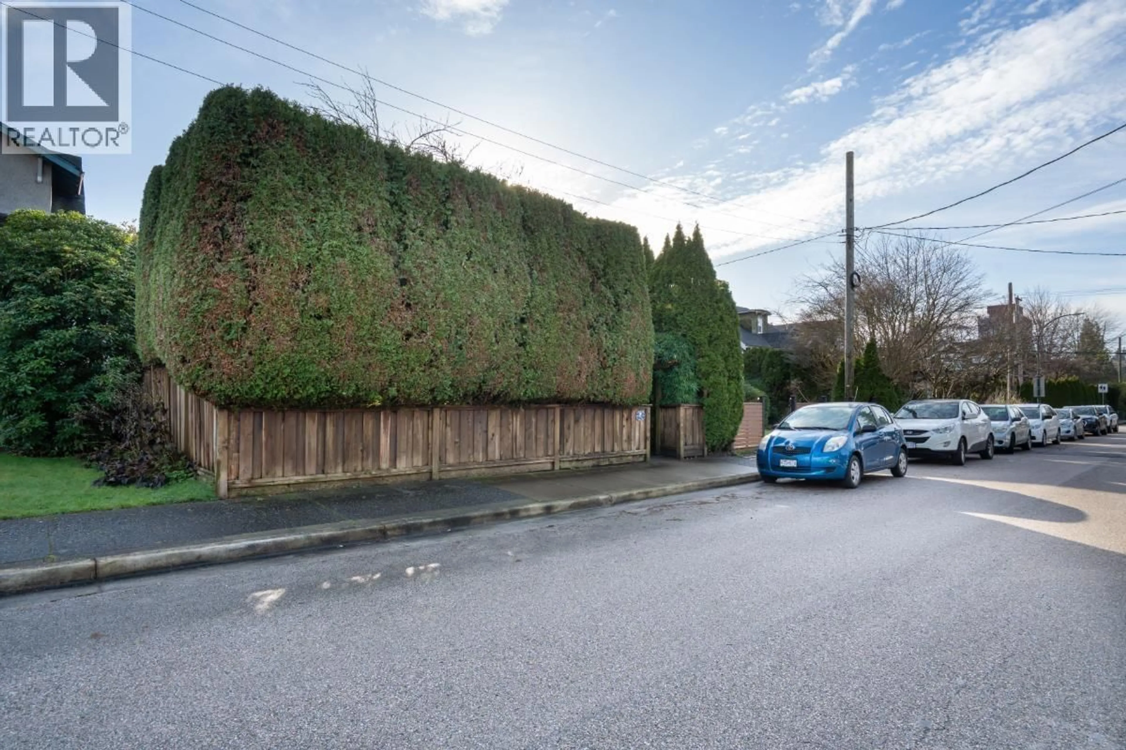 A pic from outside/outdoor area/front of a property/back of a property/a pic from drone, street for 3450 8TH AVENUE, Vancouver British Columbia V6R1Y5