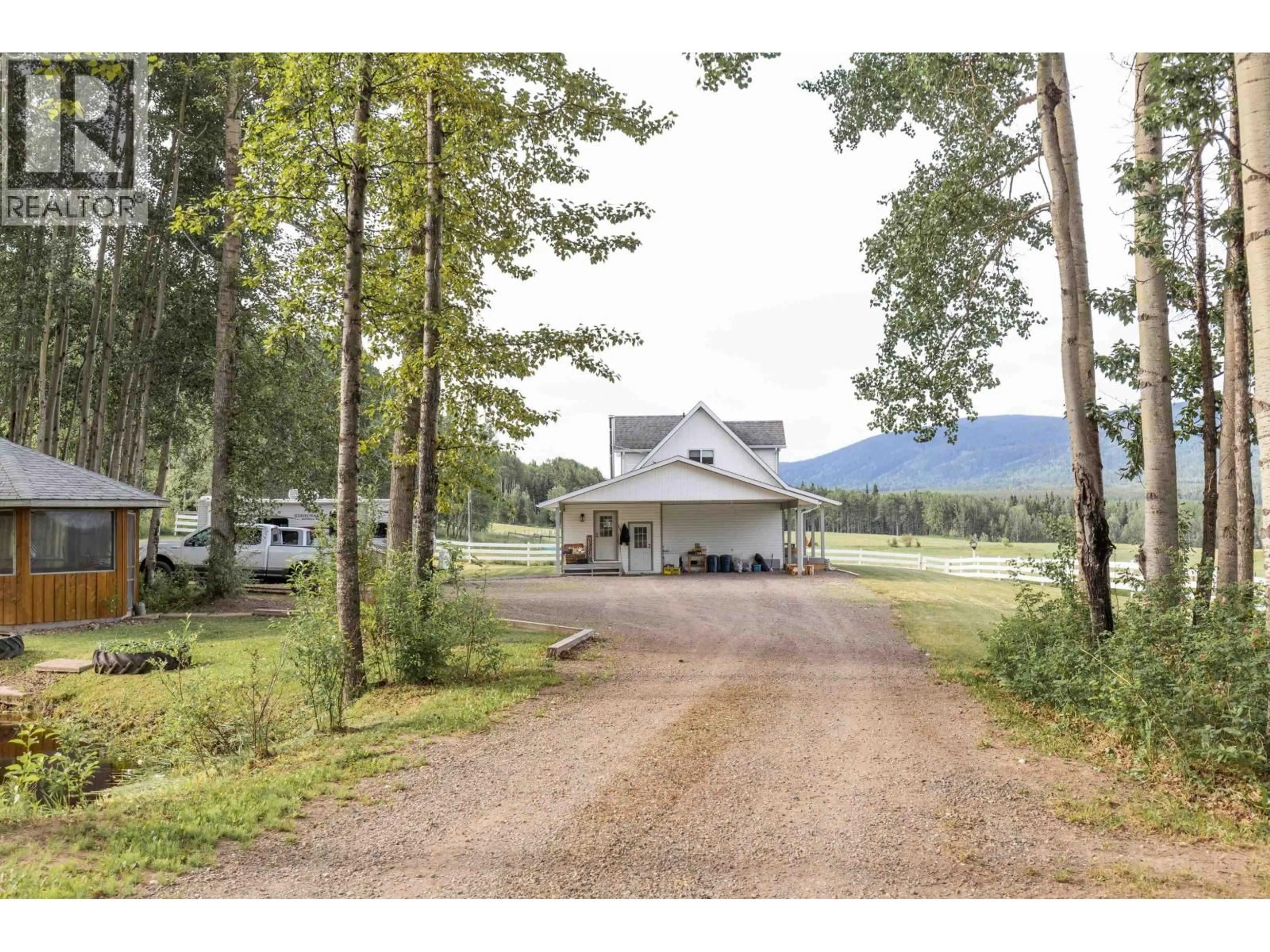 A pic from outside/outdoor area/front of a property/back of a property/a pic from drone, mountain view for 18549 16 HIGHWAY, Telkwa British Columbia V0J2X0