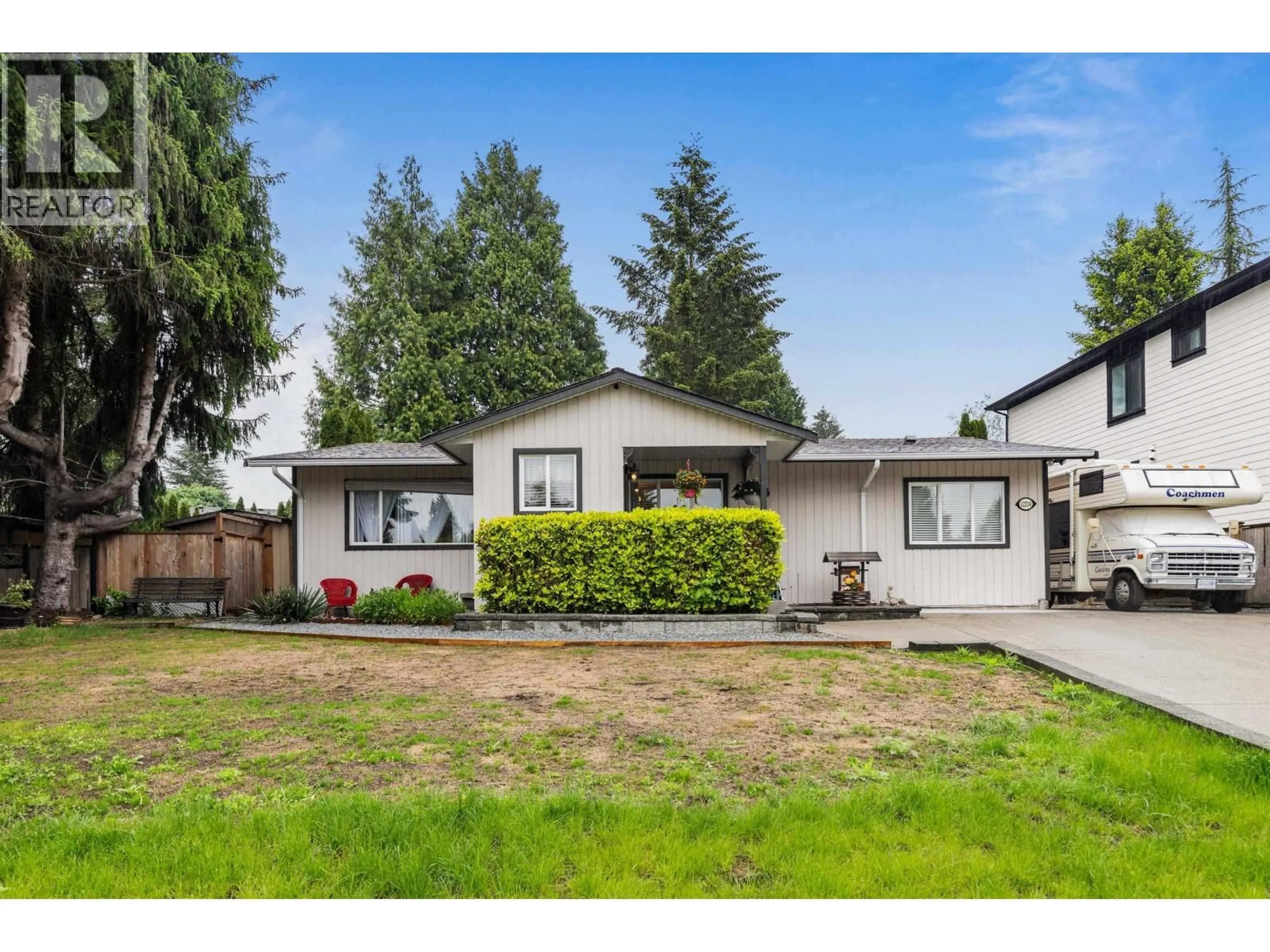 Home with vinyl exterior material, street for 12214 211 STREET, Maple Ridge British Columbia V2X8C9