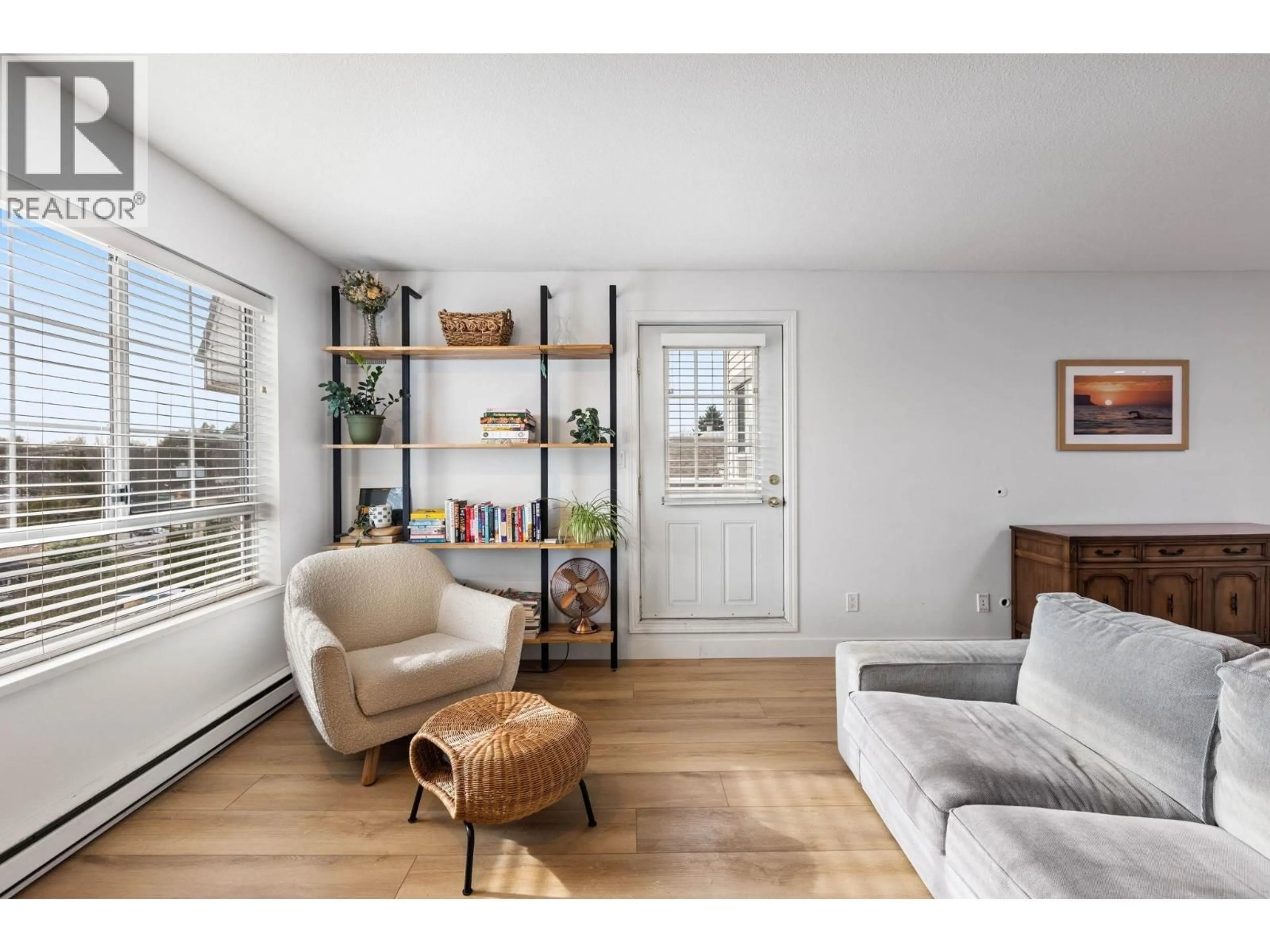 Living room with furniture, wood/laminate floor for 407 - 1950 11TH AVENUE, Vancouver British Columbia V5N1Z2