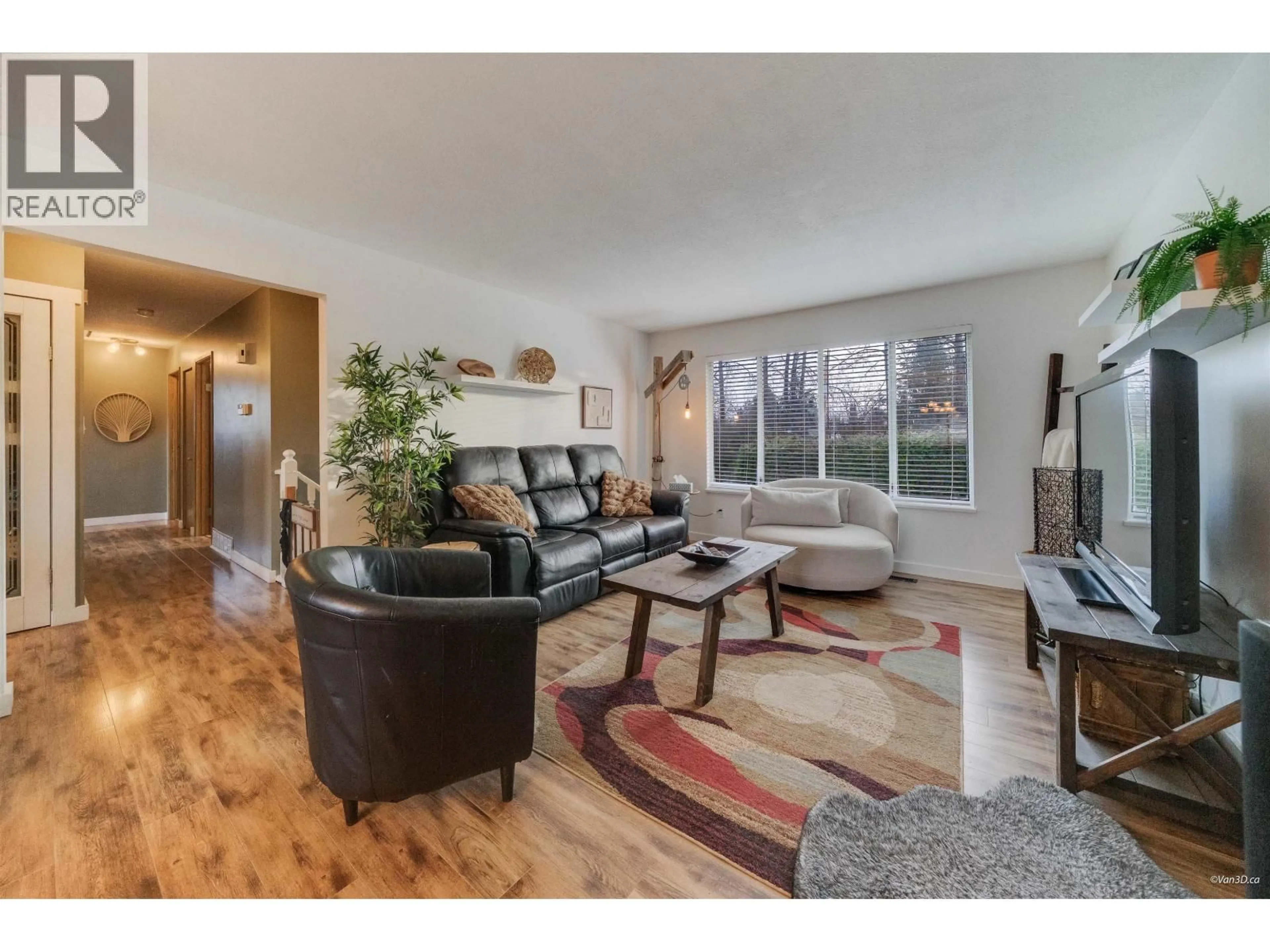 Living room with furniture, wood/laminate floor for 12515 227 STREET, Maple Ridge British Columbia V2X6K4
