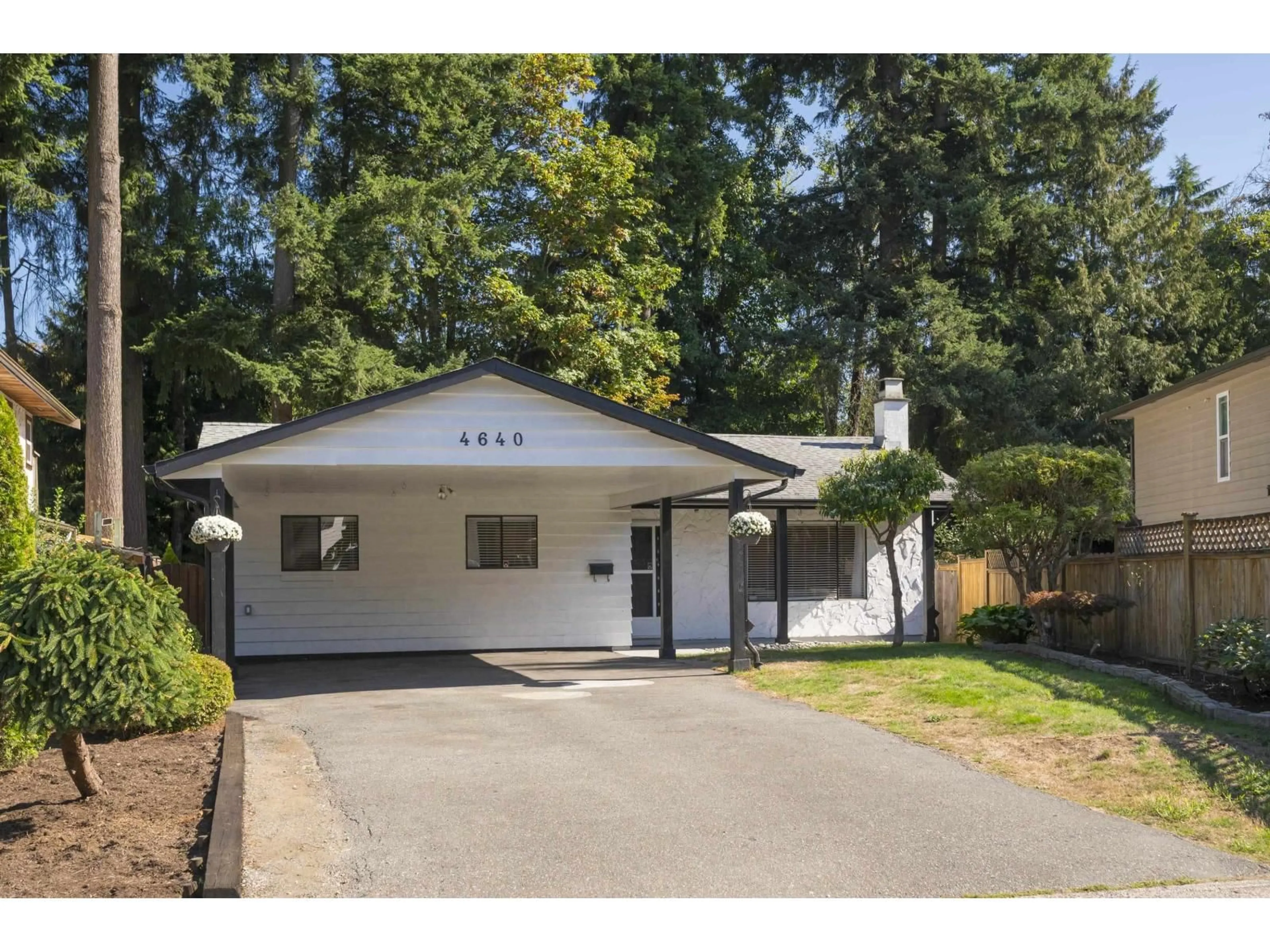 Home with vinyl exterior material, street for 4640 203A STREET, Langley British Columbia V3A5K1