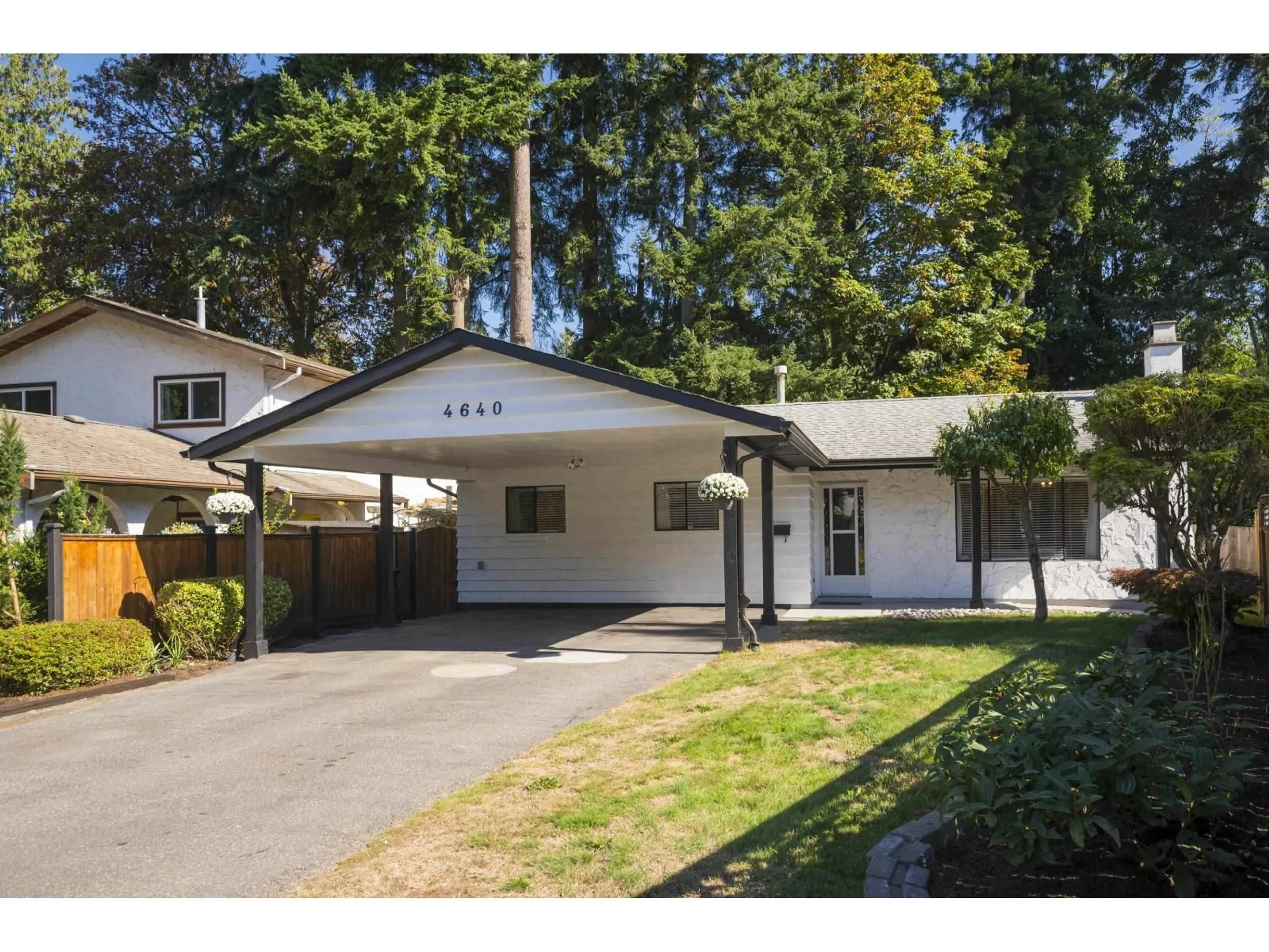 Home with vinyl exterior material, street for 4640 203A STREET, Langley British Columbia V3A5K1