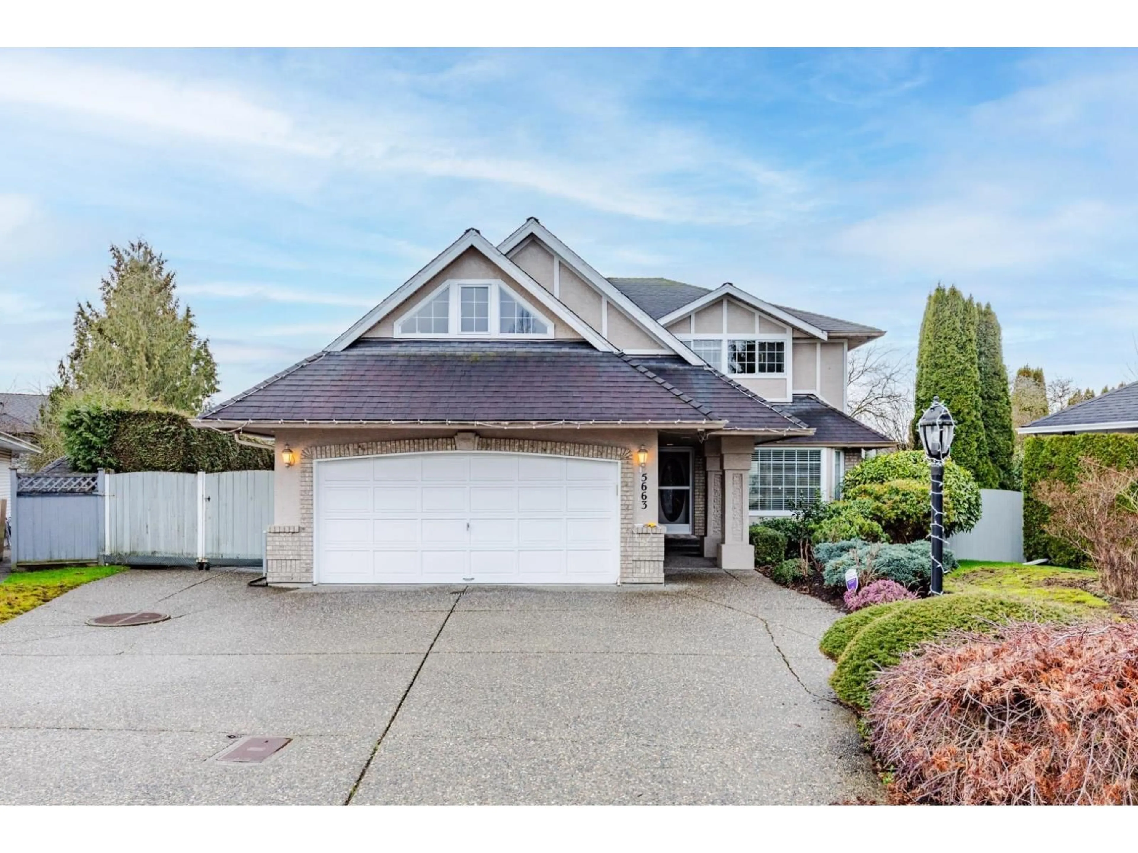 Home with vinyl exterior material, street for 5663 186A STREET, Surrey British Columbia V3S7N2