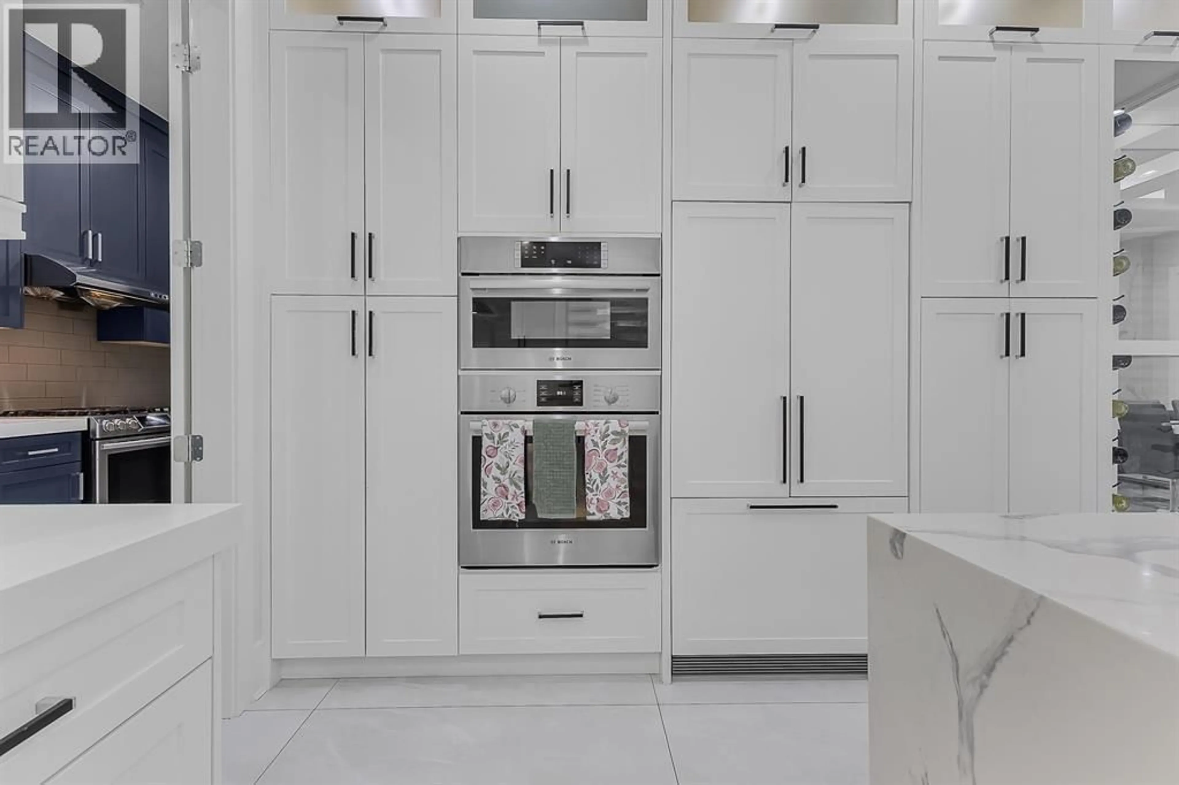 Contemporary kitchen, ceramic/tile floor for 1412 63RD AVENUE, Vancouver British Columbia V5P2L7