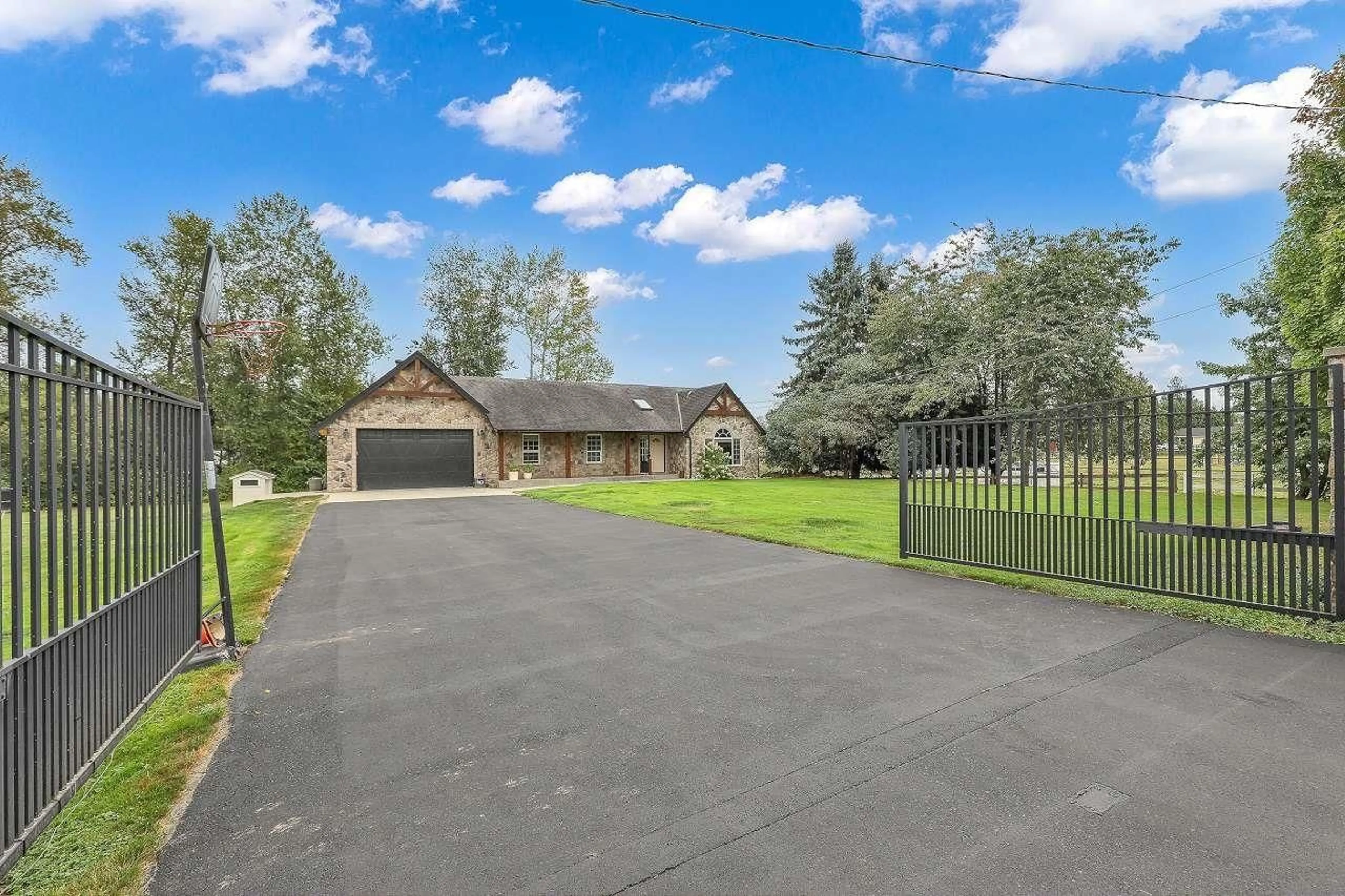 A pic from outside/outdoor area/front of a property/back of a property/a pic from drone, street for 6650 258 STREET, Langley British Columbia V4W1V3