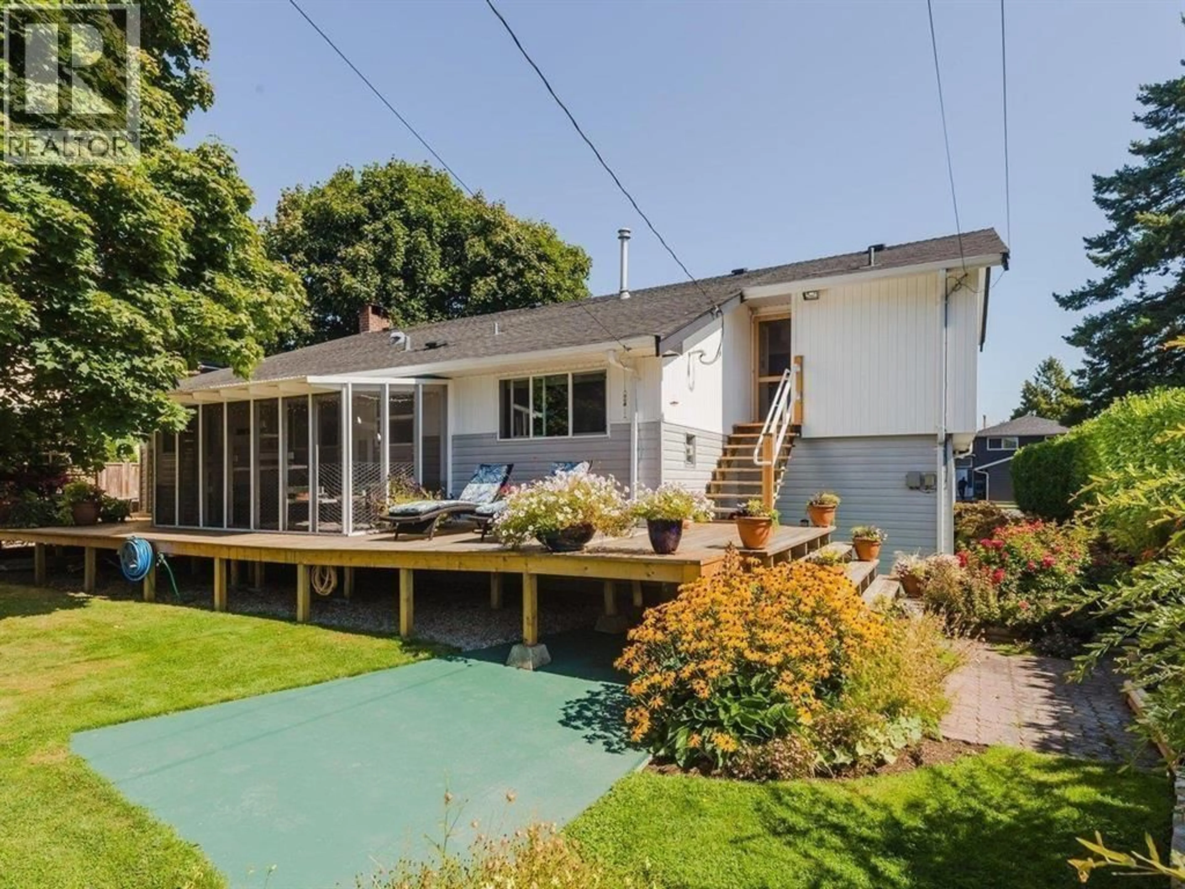 A pic from outside/outdoor area/front of a property/back of a property/a pic from drone, water/lake/river/ocean view for 10231 AINTREE CRESCENT, Richmond British Columbia V7A3T9