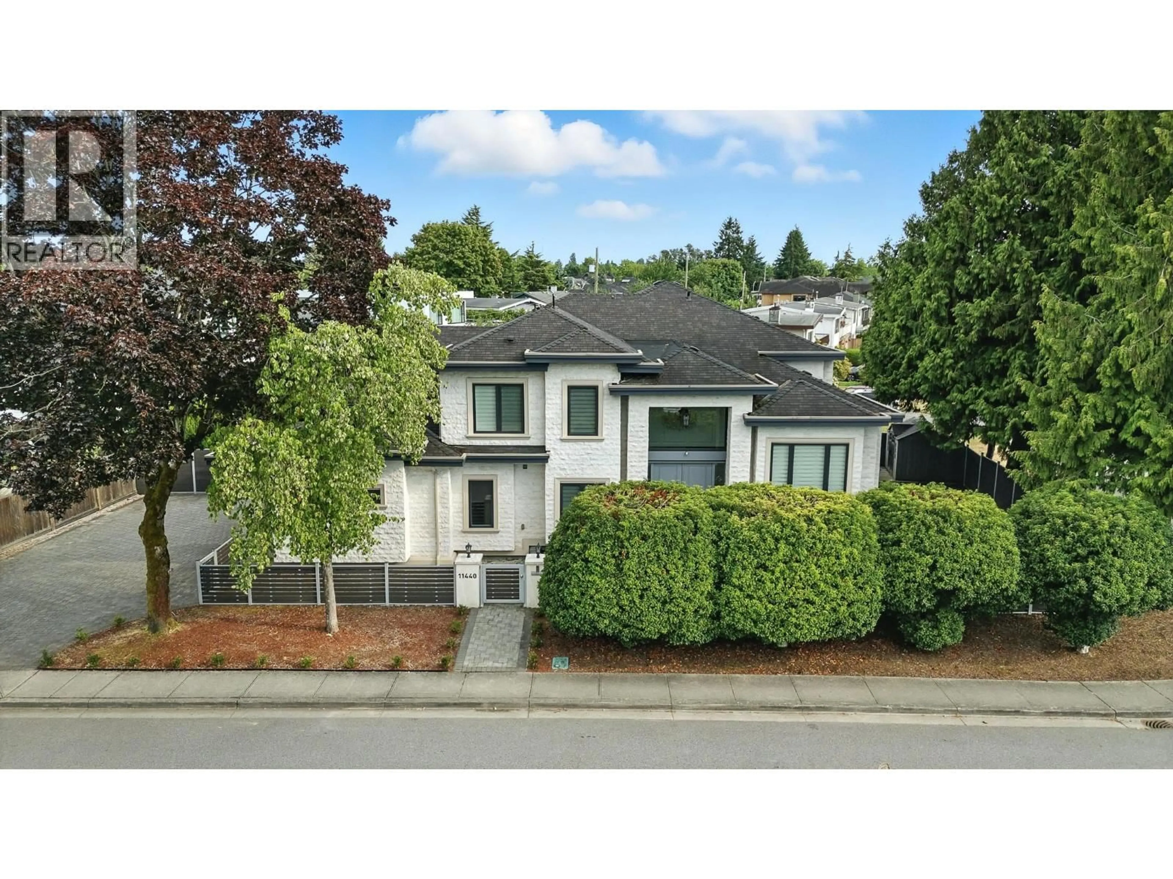 A pic from outside/outdoor area/front of a property/back of a property/a pic from drone, street for 11440 SEALORD ROAD, Richmond British Columbia V7A3L1