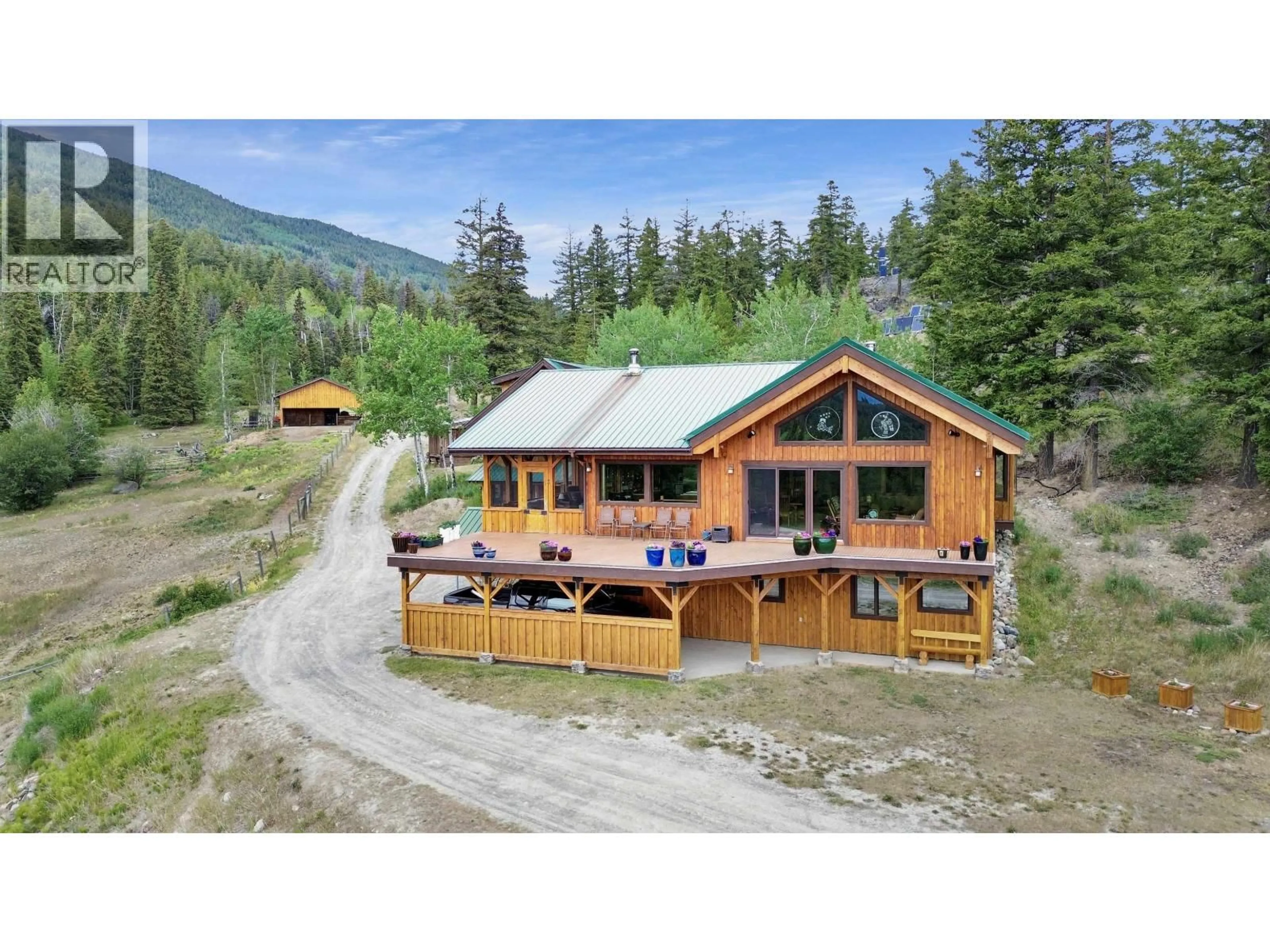 A pic from outside/outdoor area/front of a property/back of a property/a pic from drone, mountain view for 6802 TATLAYOKO ROAD, Chilcotin British Columbia V0L1W0