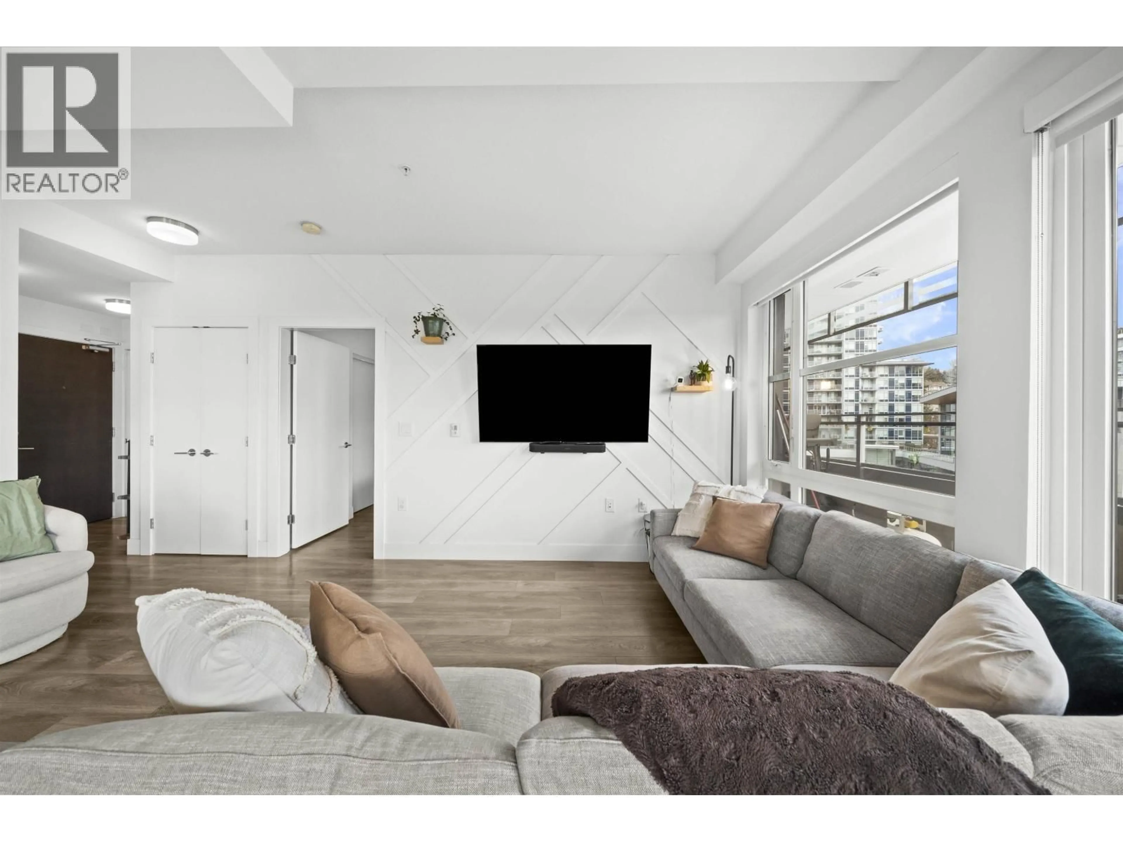 Living room with furniture, unknown for 615 - 3488 SAWMILL CRESCENT, Vancouver British Columbia V5S0C7