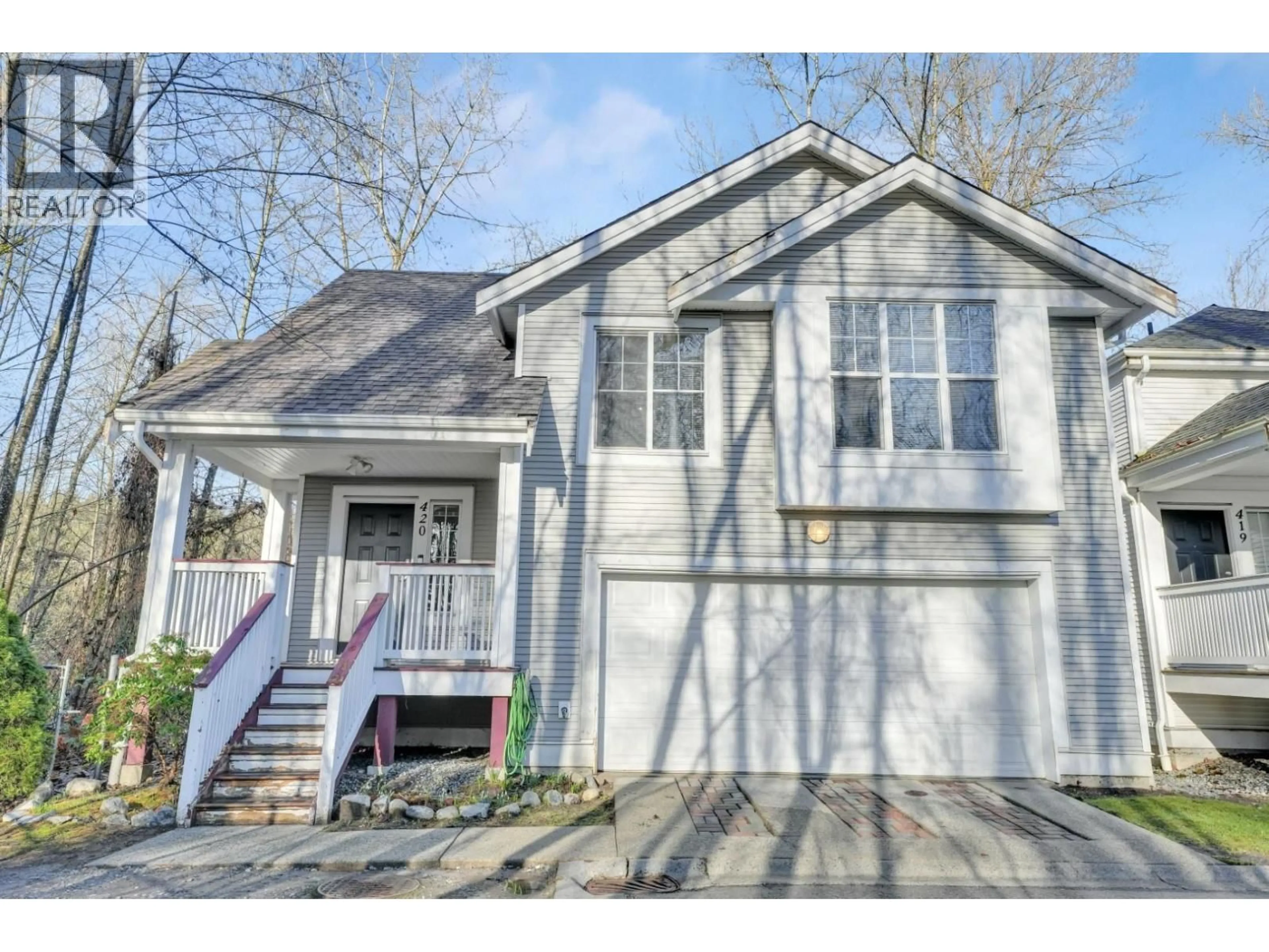 Home with vinyl exterior material, street for 420 - 3000 RIVERBEND DRIVE, Coquitlam British Columbia V3C6R1