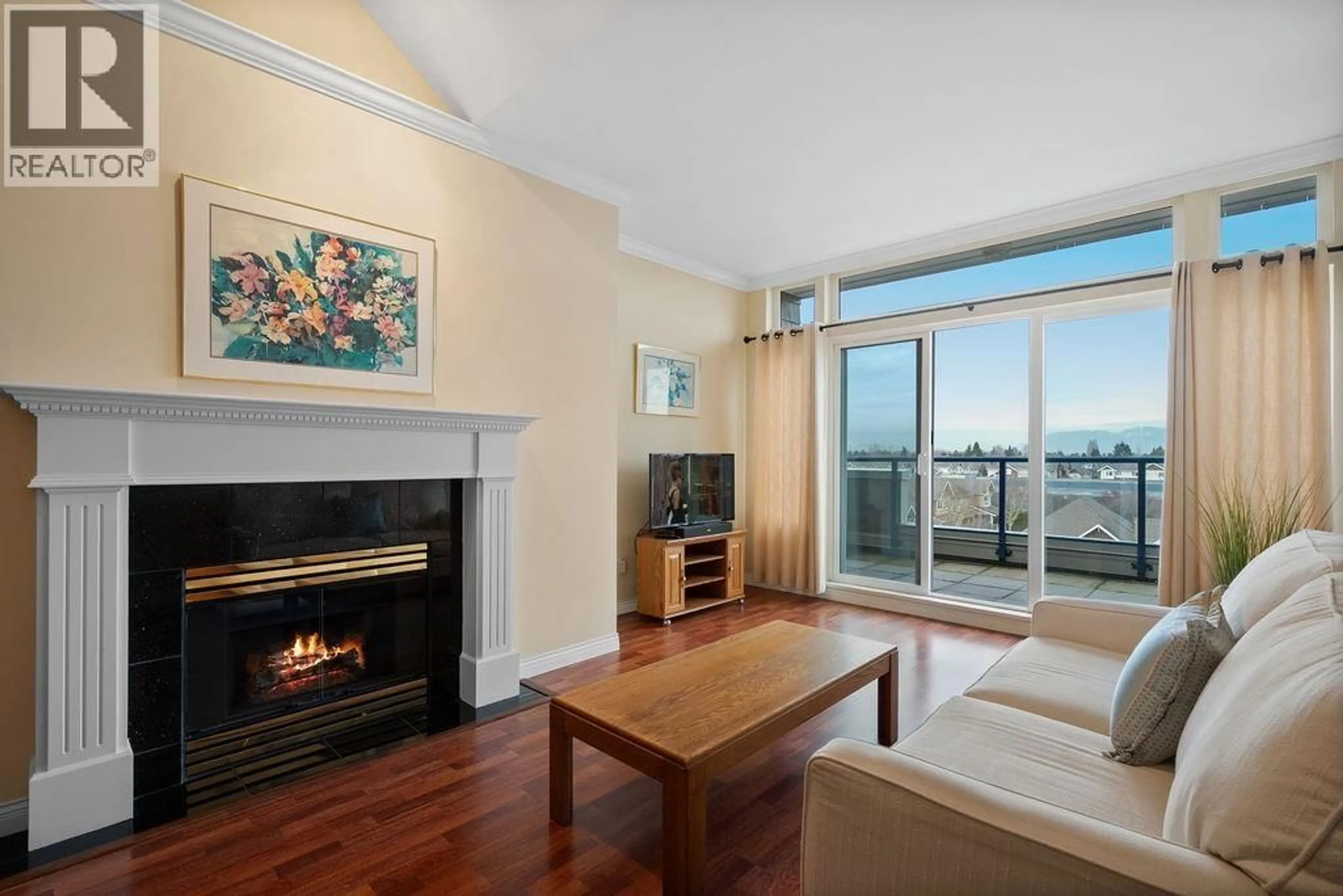 Living room with furniture, wood/laminate floor for 407 - 5800 ANDREWS ROAD, Richmond British Columbia V7E6M2