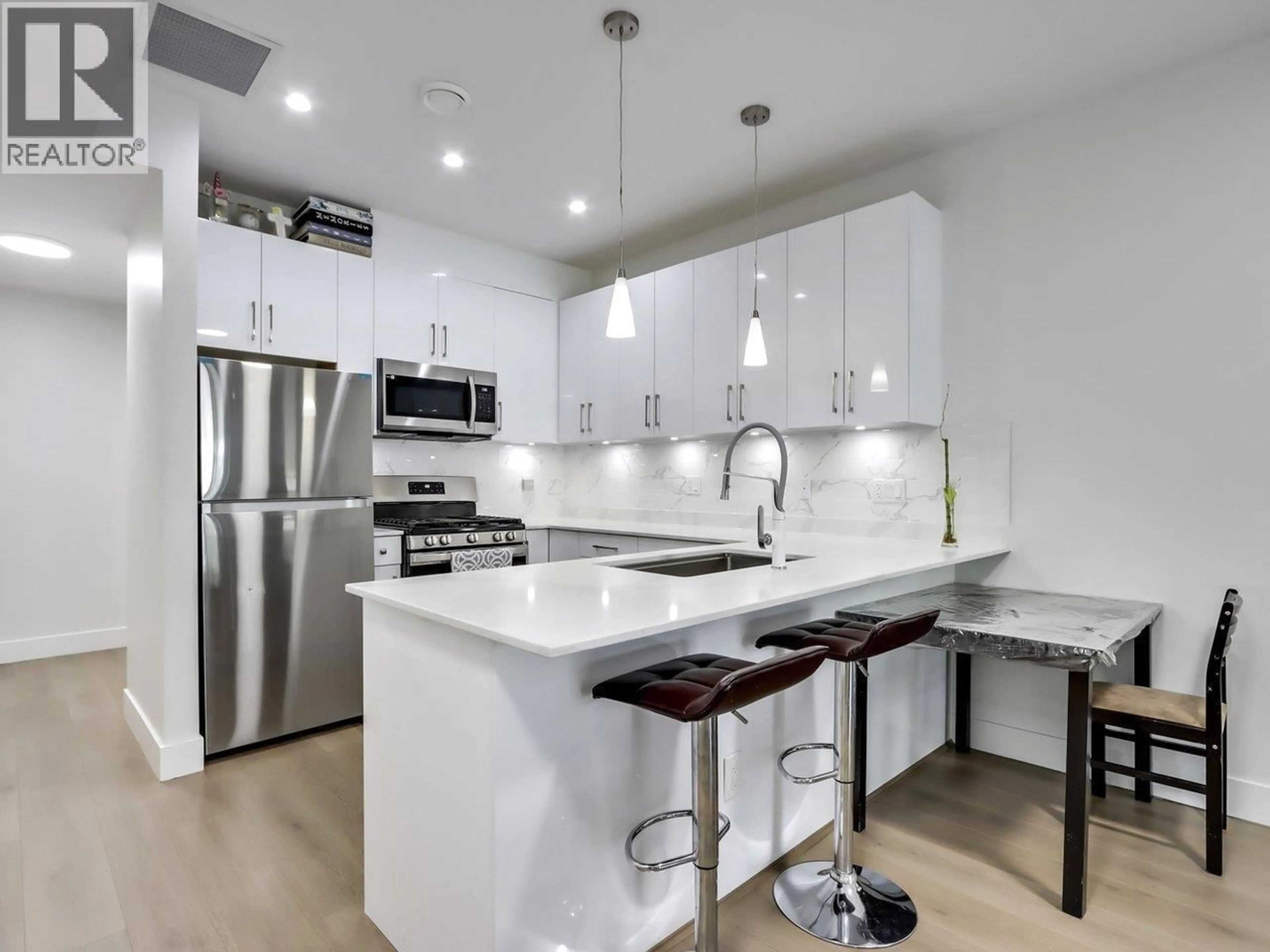 Contemporary kitchen, unknown for 103 - 906 QUADLING AVENUE, Coquitlam British Columbia V3K2A5