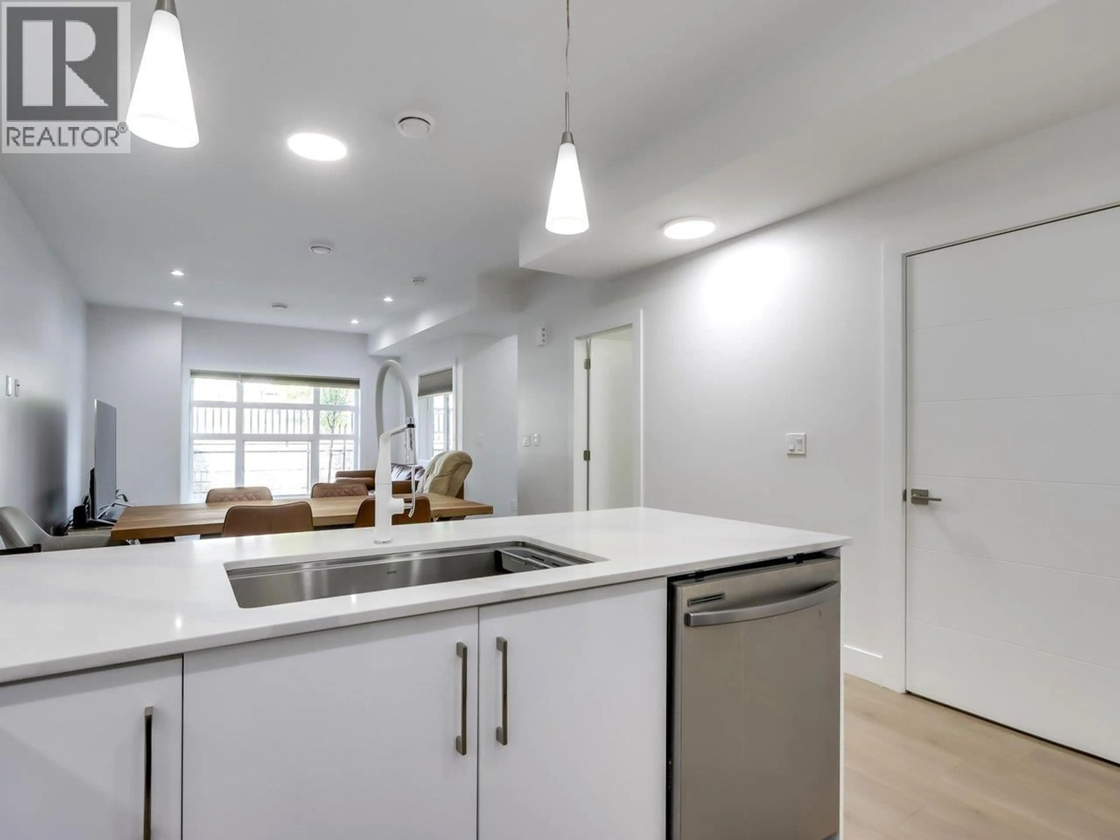 Open concept kitchen, unknown for 103 - 906 QUADLING AVENUE, Coquitlam British Columbia V3K2A5