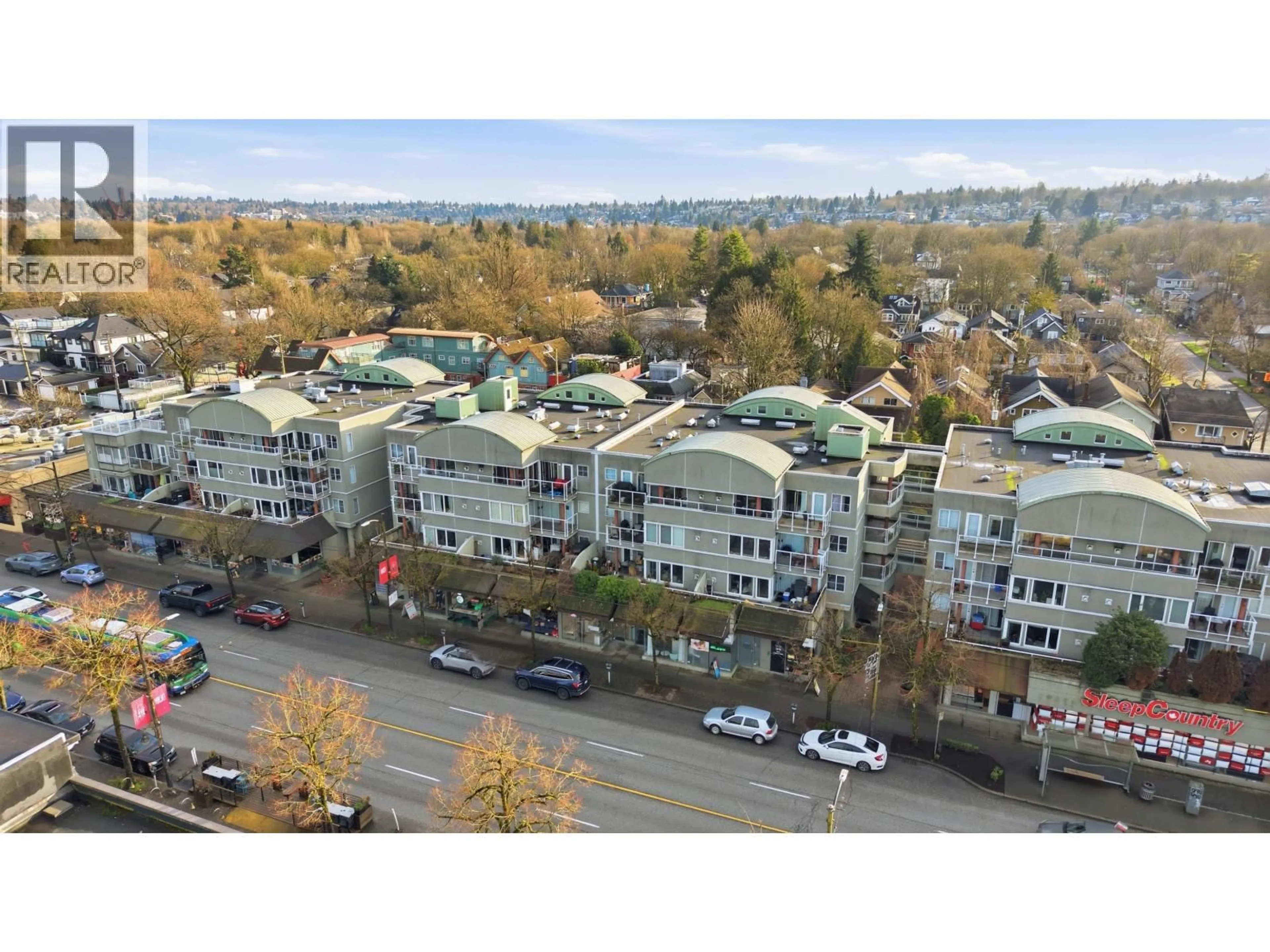 A pic from outside/outdoor area/front of a property/back of a property/a pic from drone, city buildings view from balcony for 216 - 3250 BROADWAY, Vancouver British Columbia V6K2H4