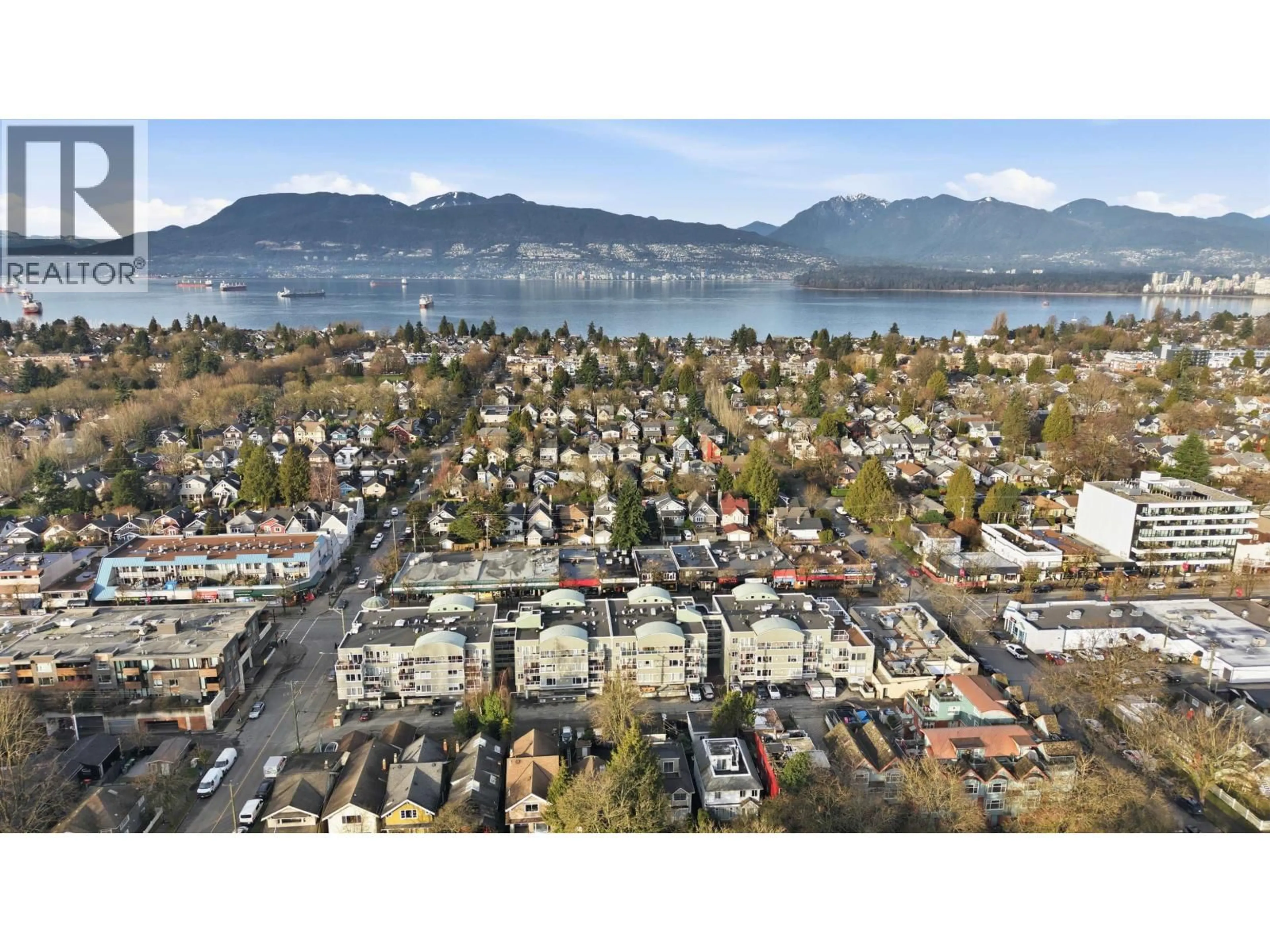 A pic from outside/outdoor area/front of a property/back of a property/a pic from drone, mountain view for 216 - 3250 BROADWAY, Vancouver British Columbia V6K2H4