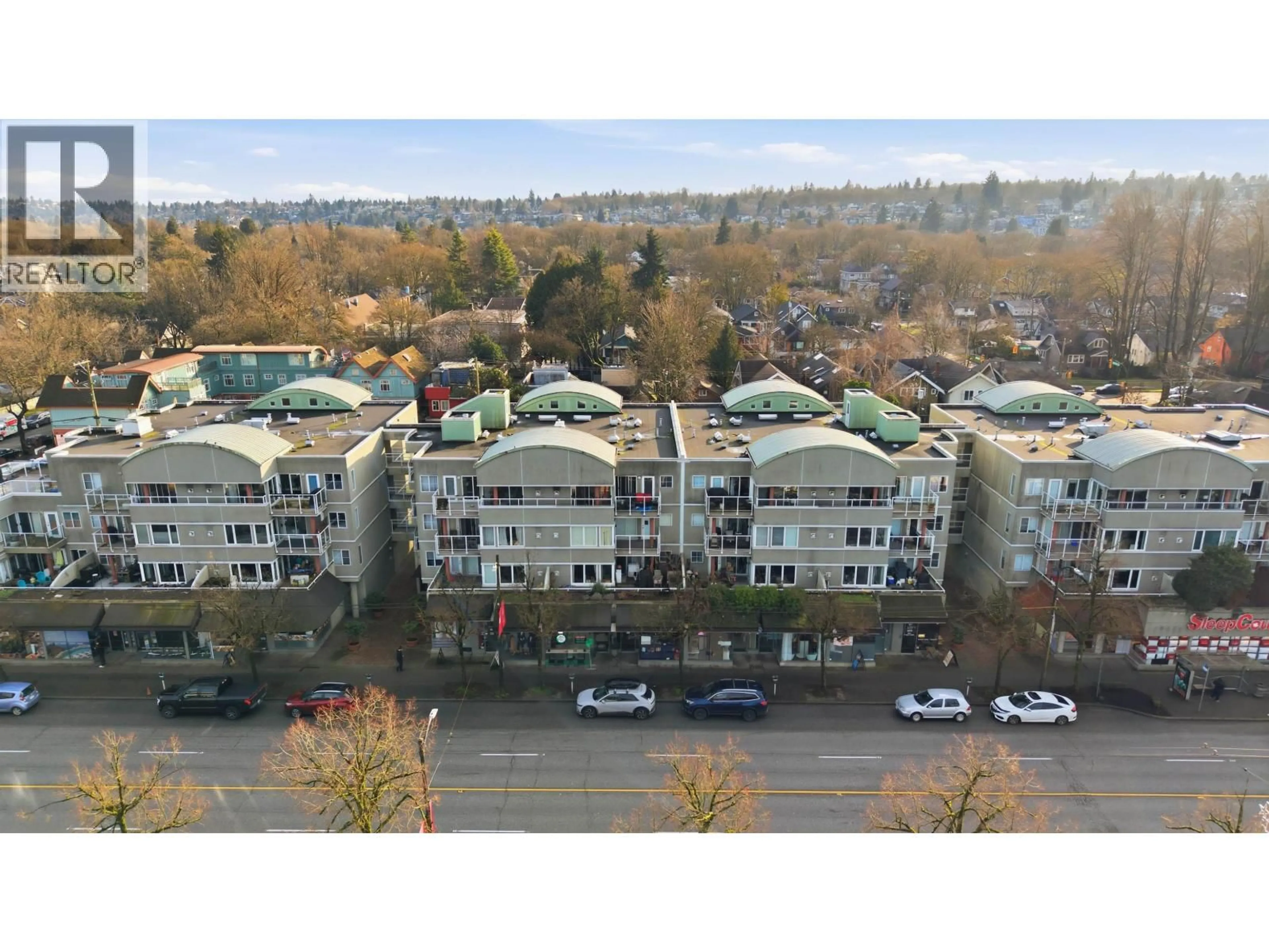 A pic from outside/outdoor area/front of a property/back of a property/a pic from drone, city buildings view from balcony for 216 - 3250 BROADWAY, Vancouver British Columbia V6K2H4