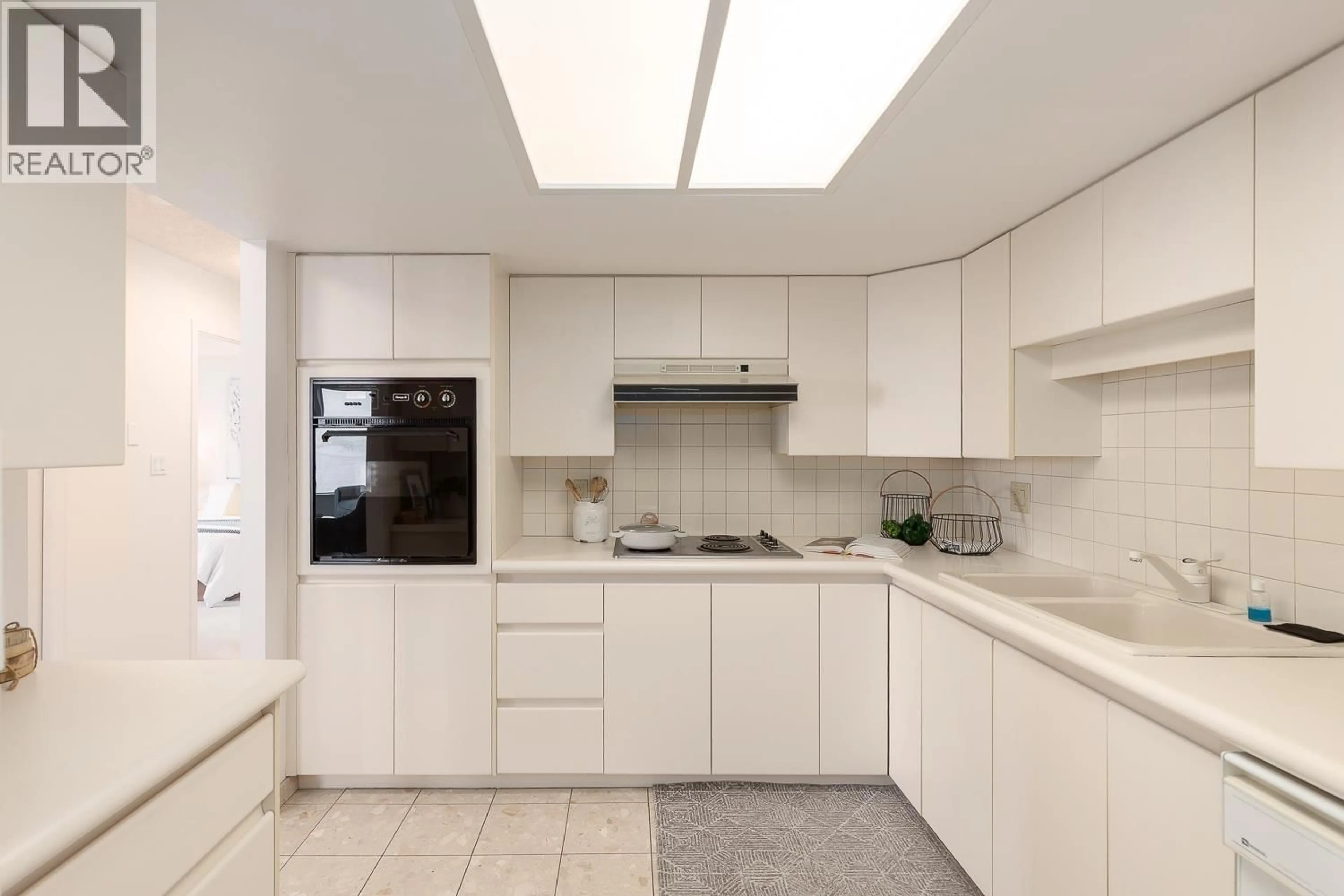 Contemporary kitchen, ceramic/tile floor for 808 - 168 CHADWICK COURT, North Vancouver British Columbia V7M3L4