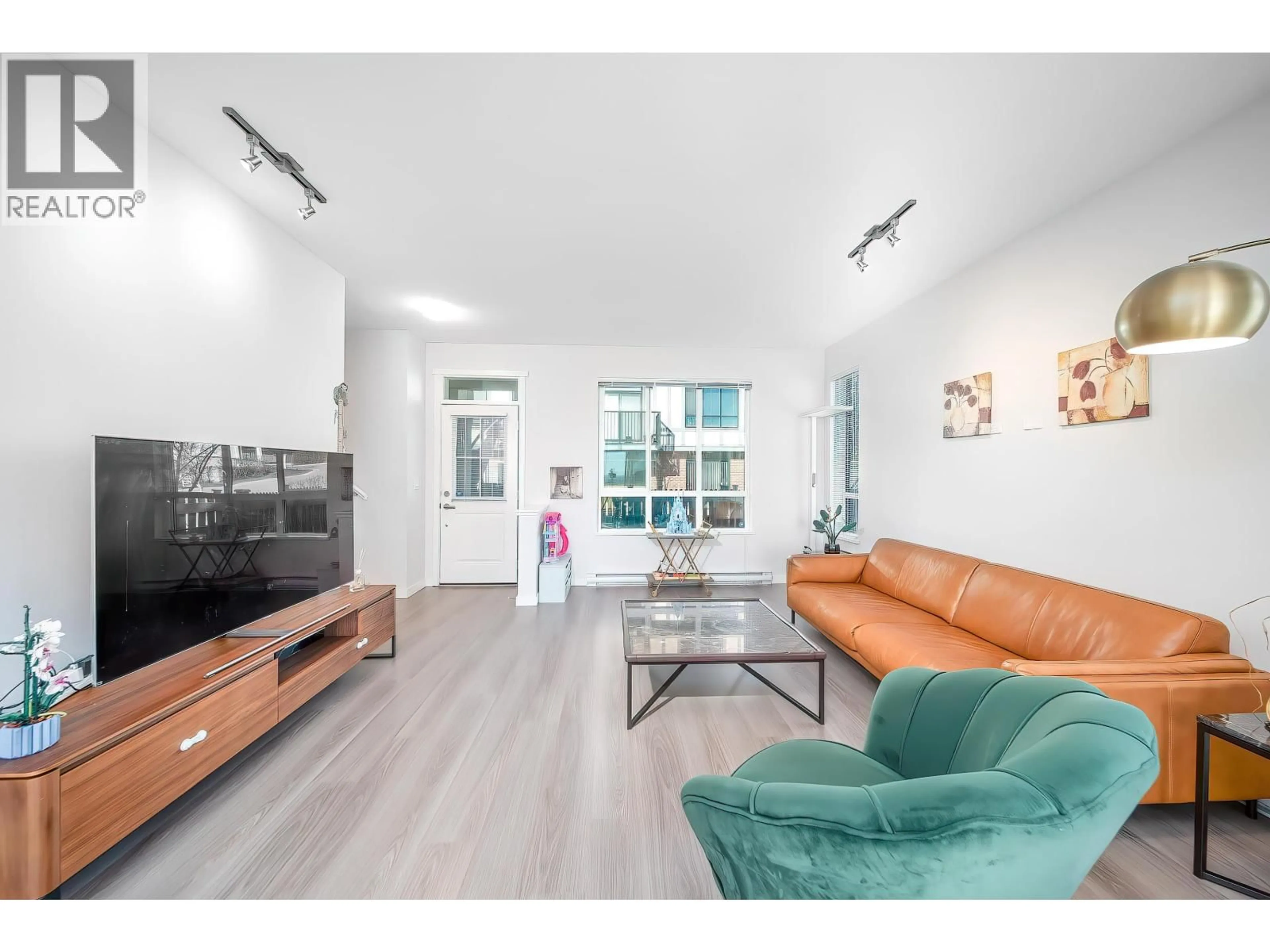 Living room with furniture, unknown for 119 - 3500 BURKE VILLAGE PROMENADE, Coquitlam British Columbia V3E0N2