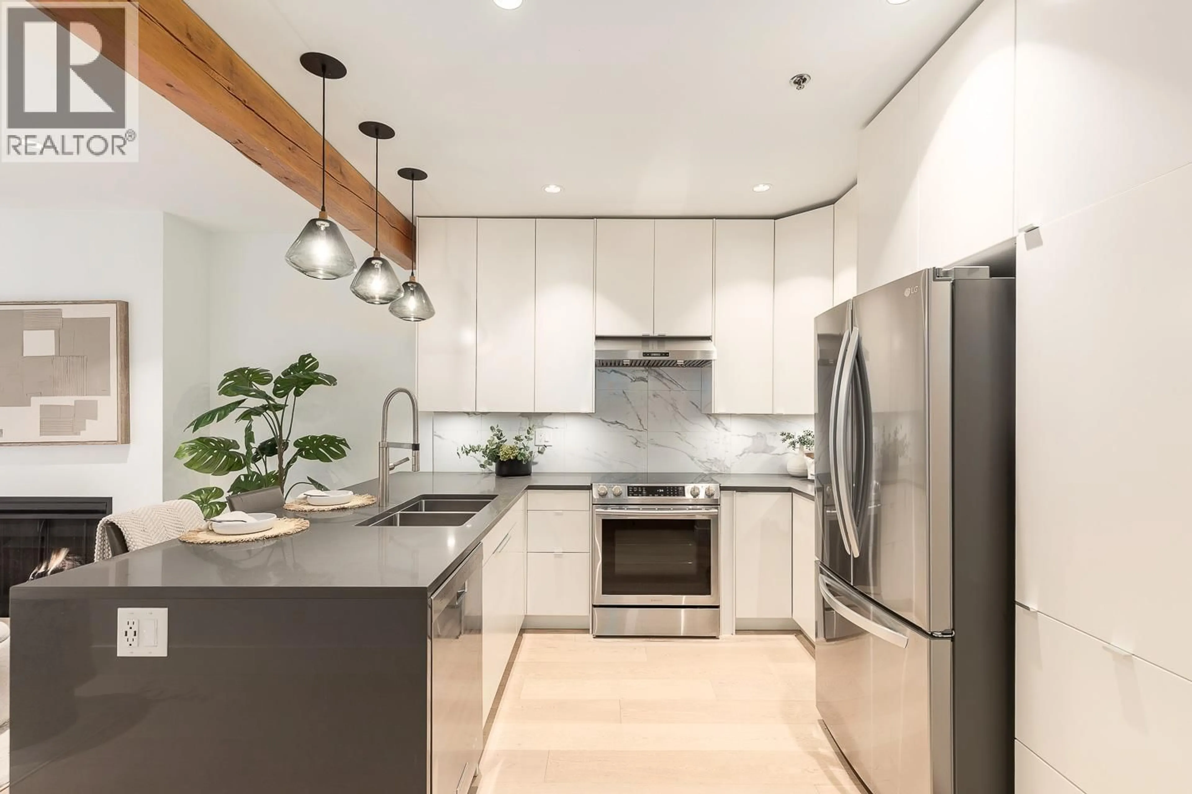 Contemporary kitchen, ceramic/tile floor for 105 - 1963 3RD AVENUE, Vancouver British Columbia V6J1L2