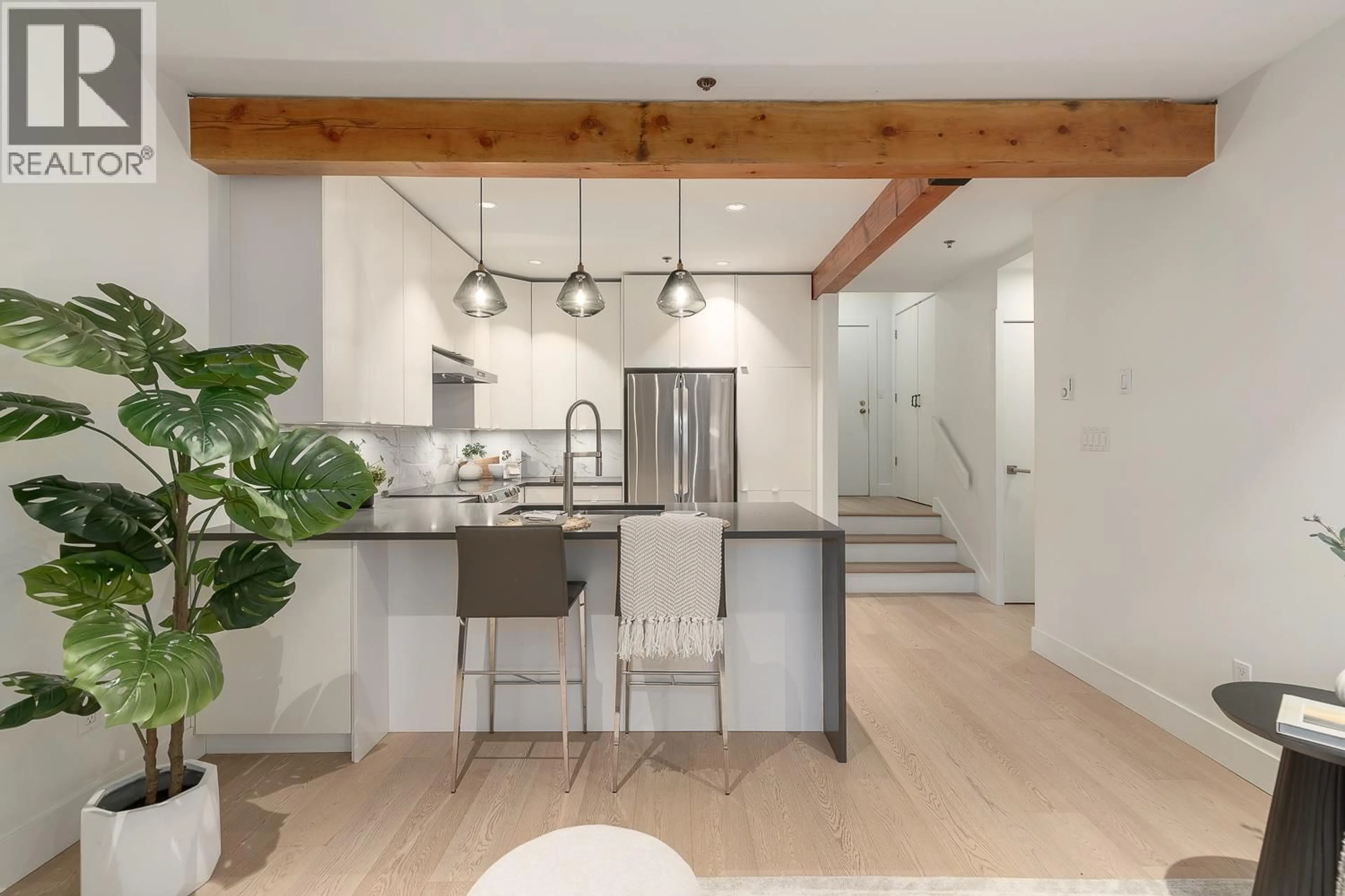 Open concept kitchen, unknown for 105 - 1963 3RD AVENUE, Vancouver British Columbia V6J1L2