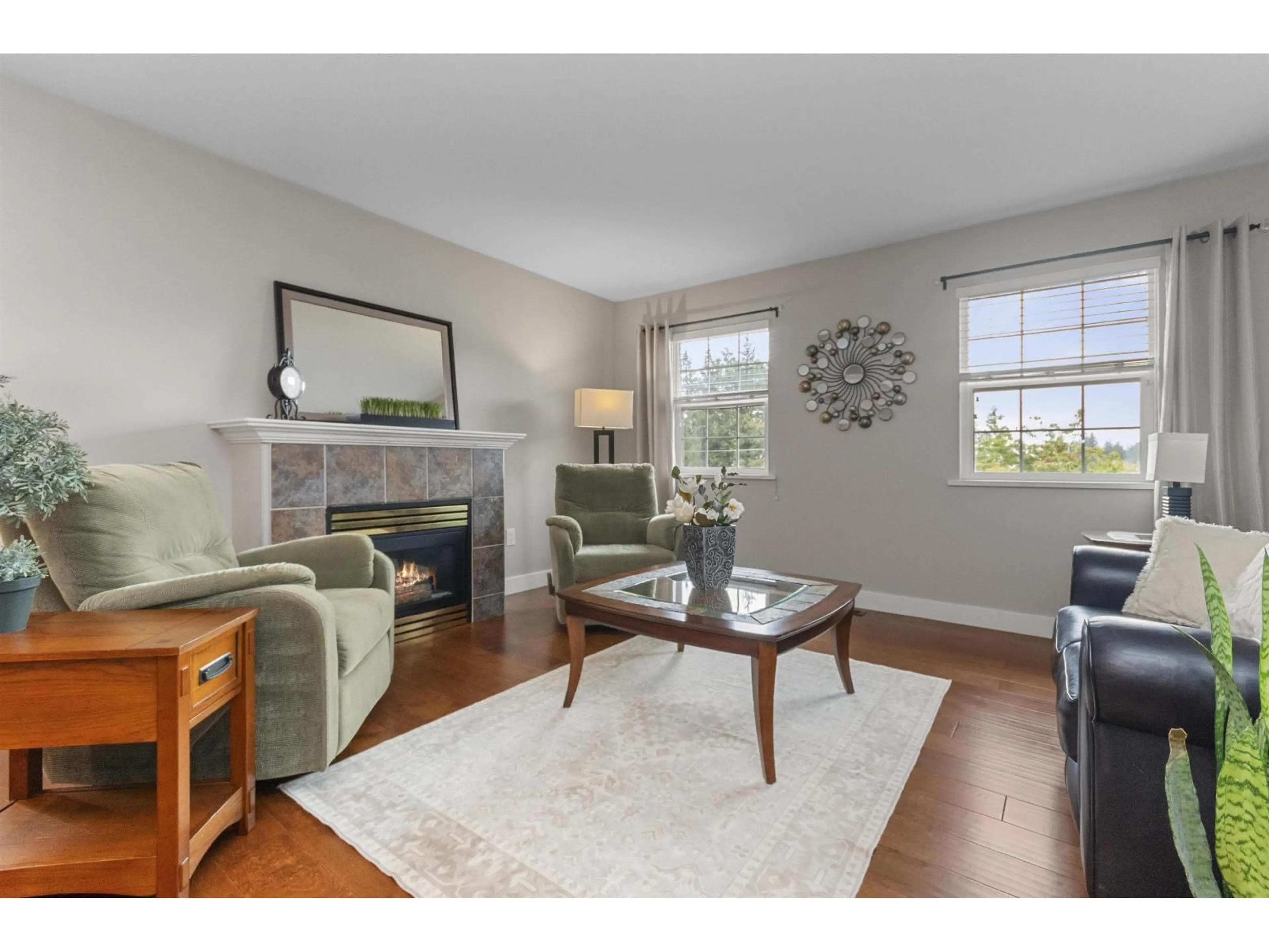 Living room with furniture, wood/laminate floor for 36135 MARSHALL ROAD, Abbotsford British Columbia V3G2W9