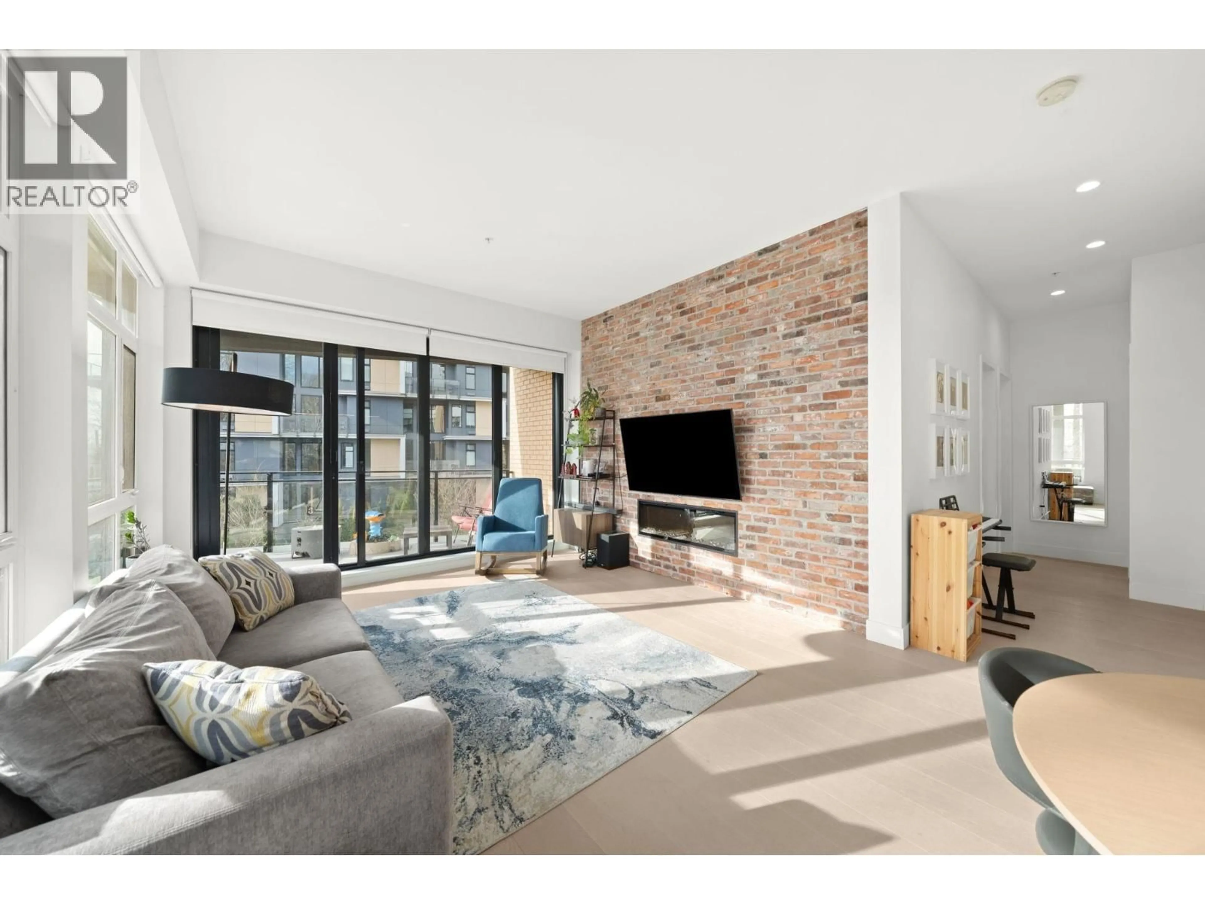 Living room with furniture, unknown for 214 - 300 SALTER STREET, New Westminster British Columbia V3M0L9