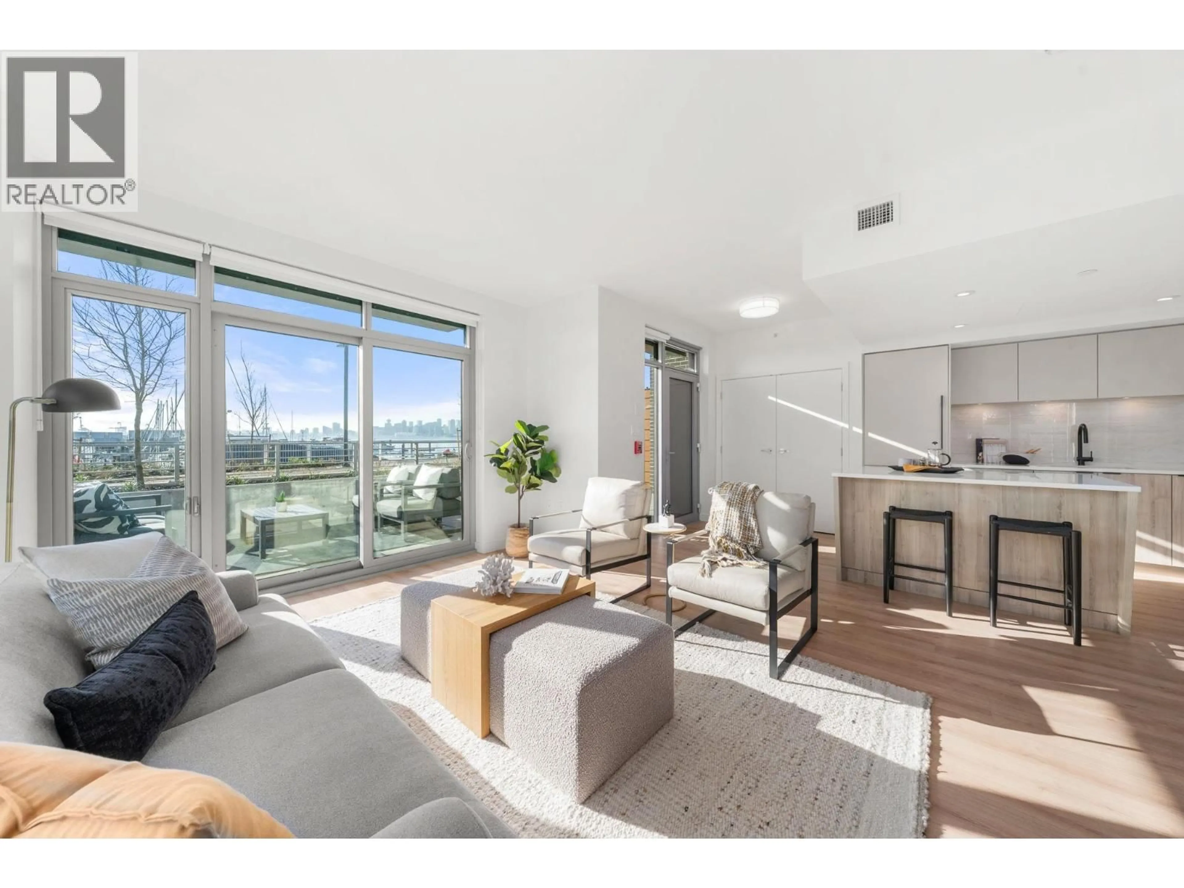 Living room with furniture, unknown for 110 - 755 HARBOURSIDE DRIVE, North Vancouver British Columbia V7P0G1