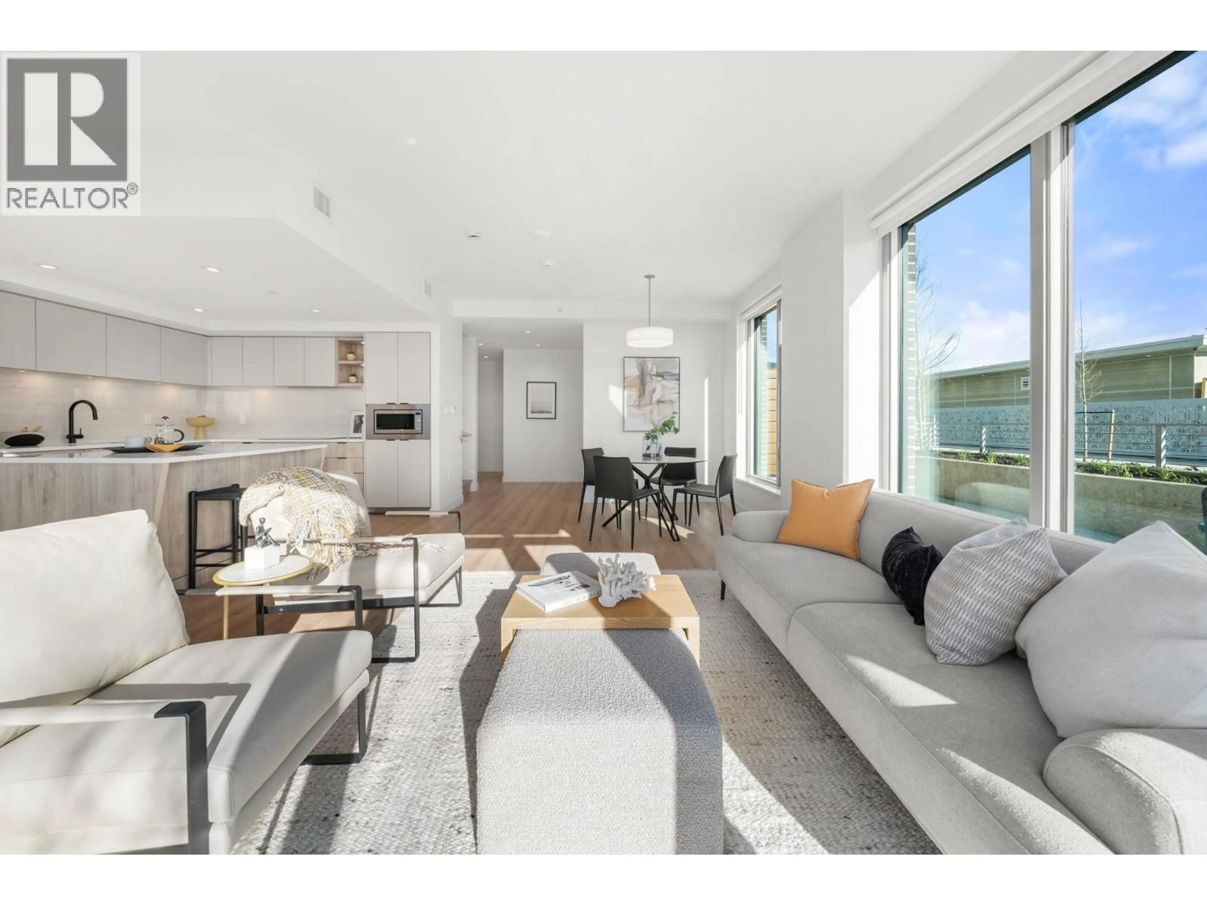 Living room with furniture, unknown for 110 - 755 HARBOURSIDE DRIVE, North Vancouver British Columbia V7P0G1