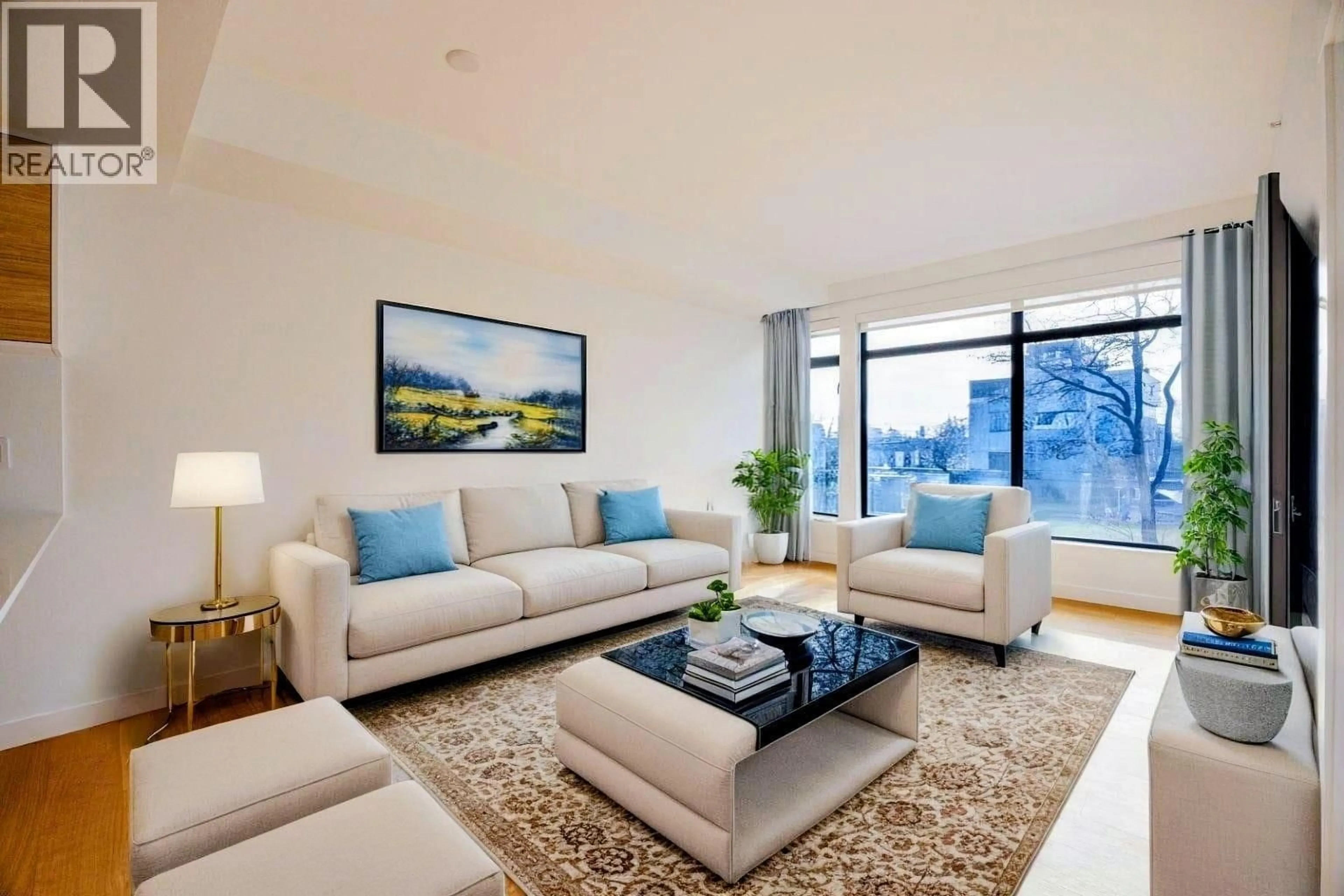 Living room with furniture, carpet floor for 404 - 6485 MANITOBA STREET, Vancouver British Columbia V5Y2Z7