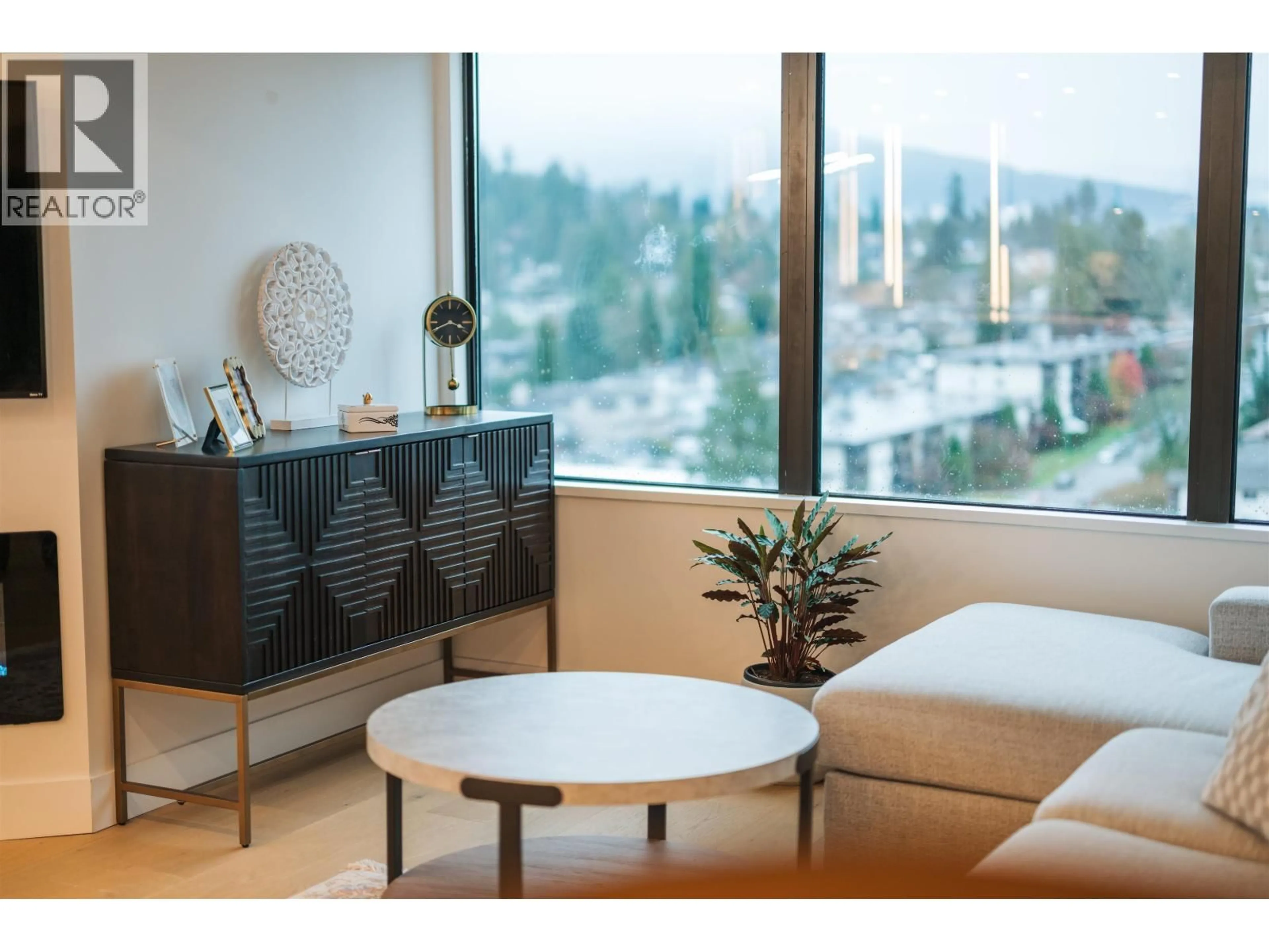 Living room with furniture, wood/laminate floor for 1207 - 1515 EASTERN AVENUE, North Vancouver British Columbia V7L4R2