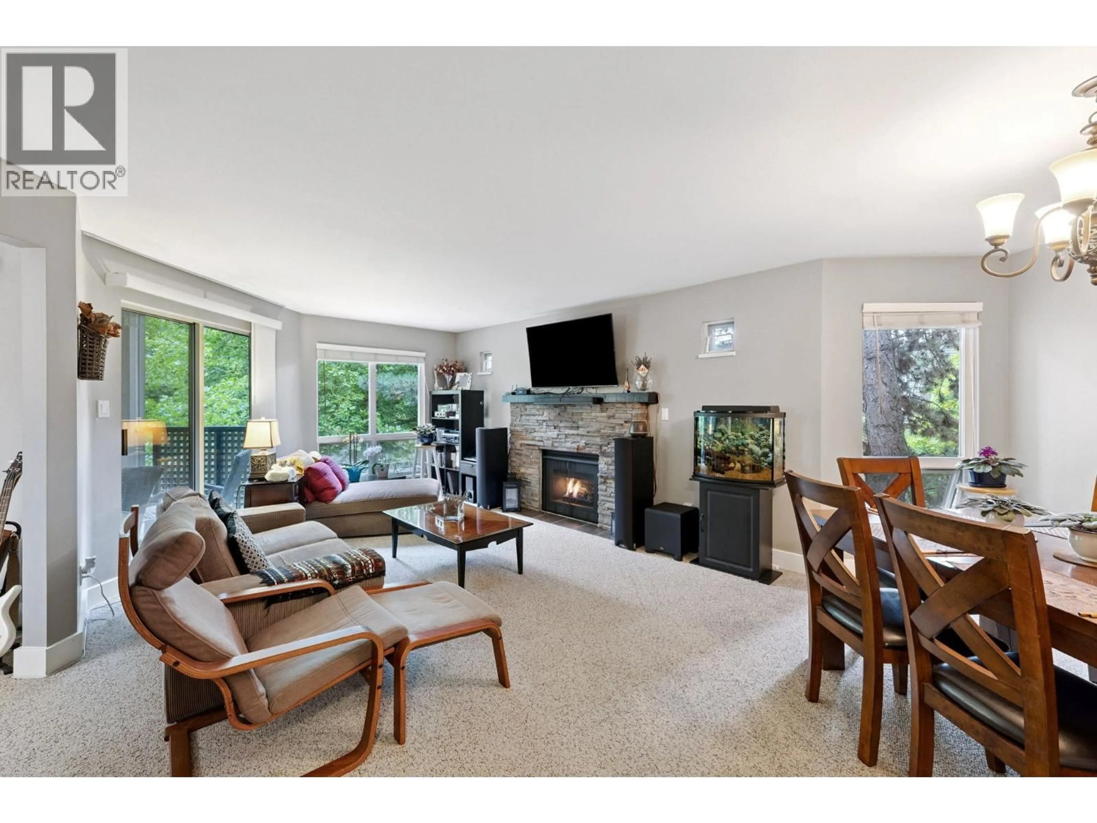 Living room with furniture, unknown for 206 - 7459 MOFFATT ROAD, Richmond British Columbia V6Y1X9