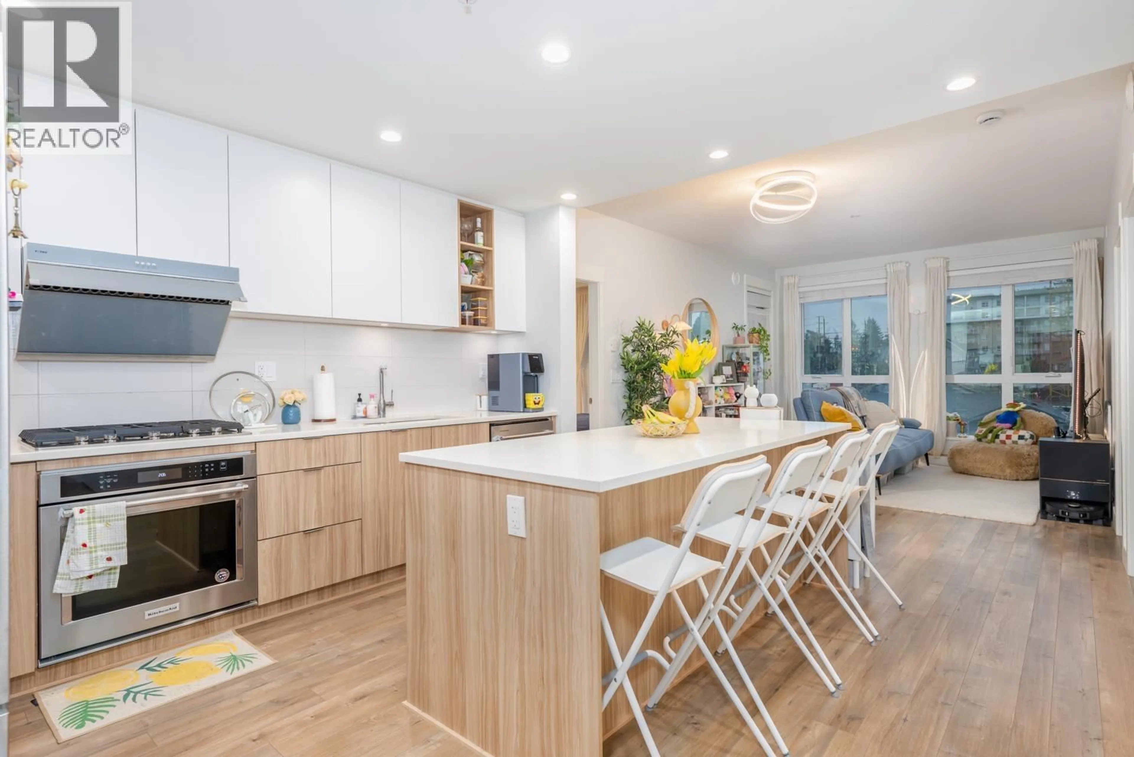 Open concept kitchen, wood/laminate floor for 403 - 750 DOGWOOD STREET, Coquitlam British Columbia V3J4B7