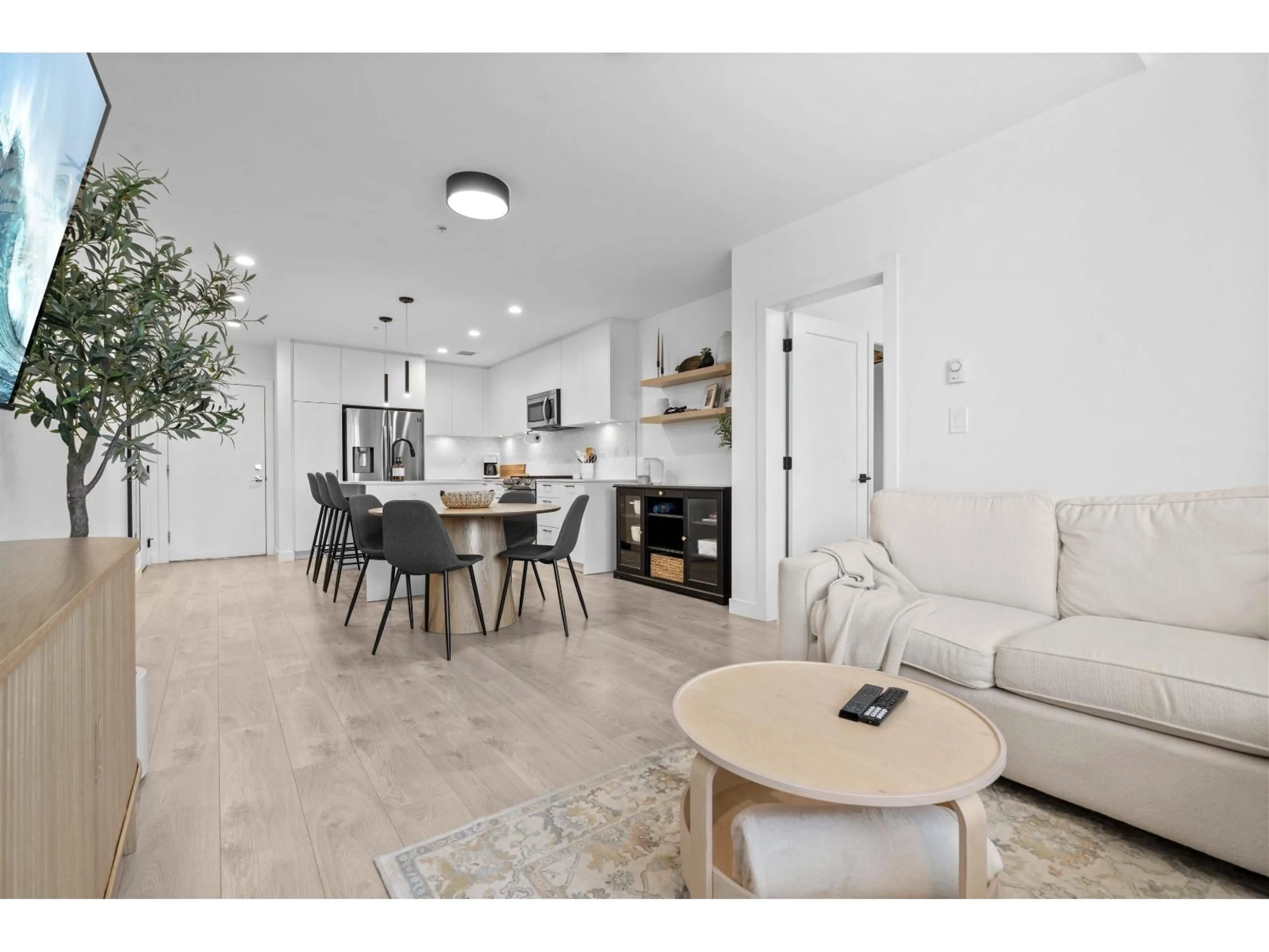 Open concept kitchen, wood/laminate floor for A412 - 20018 83A AVENUE, Langley British Columbia V2Y3P2