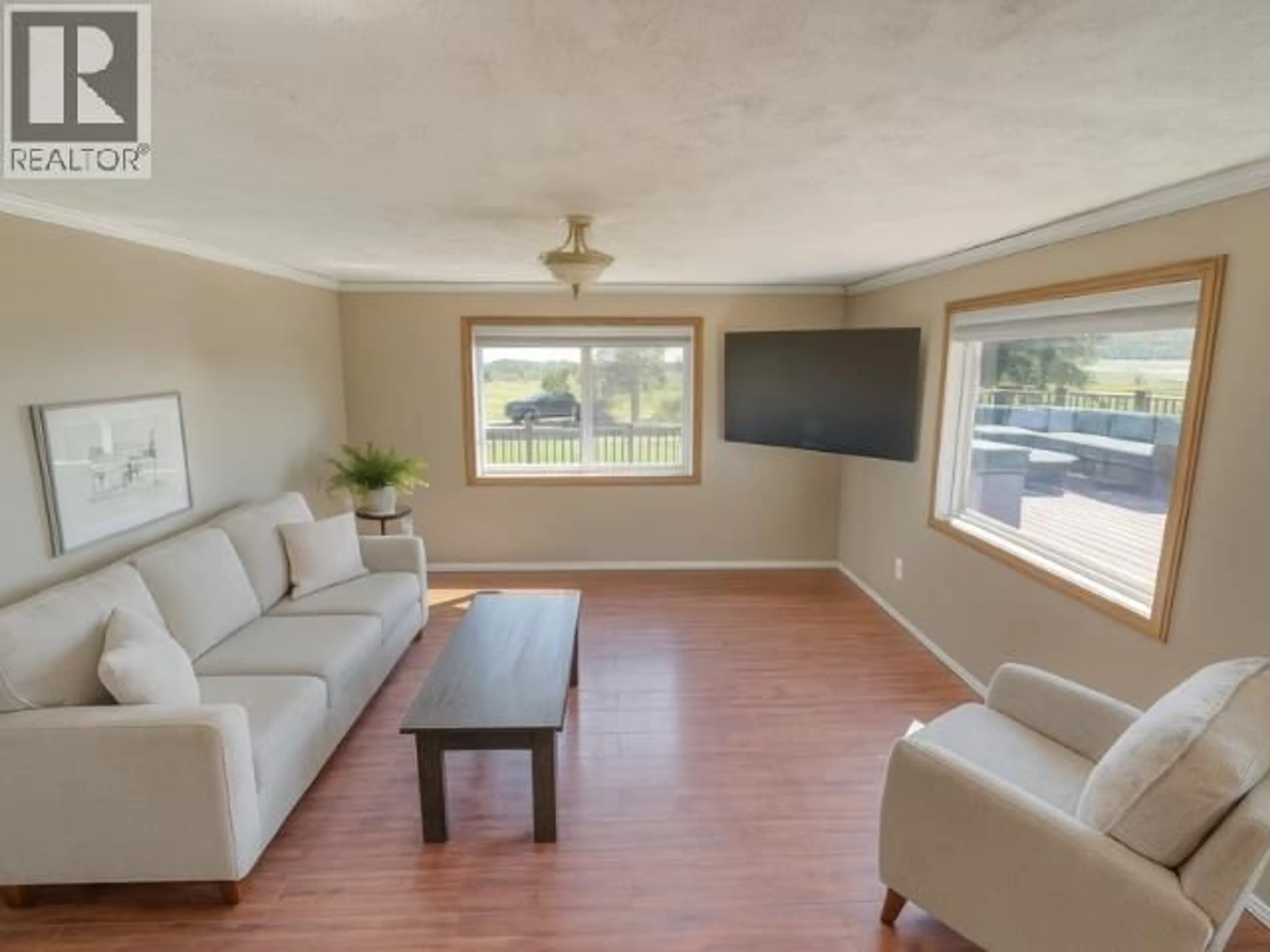 Living room with furniture, unknown for 17266 PRESPATOU ROAD, Fort St. John British Columbia V0C1Y0