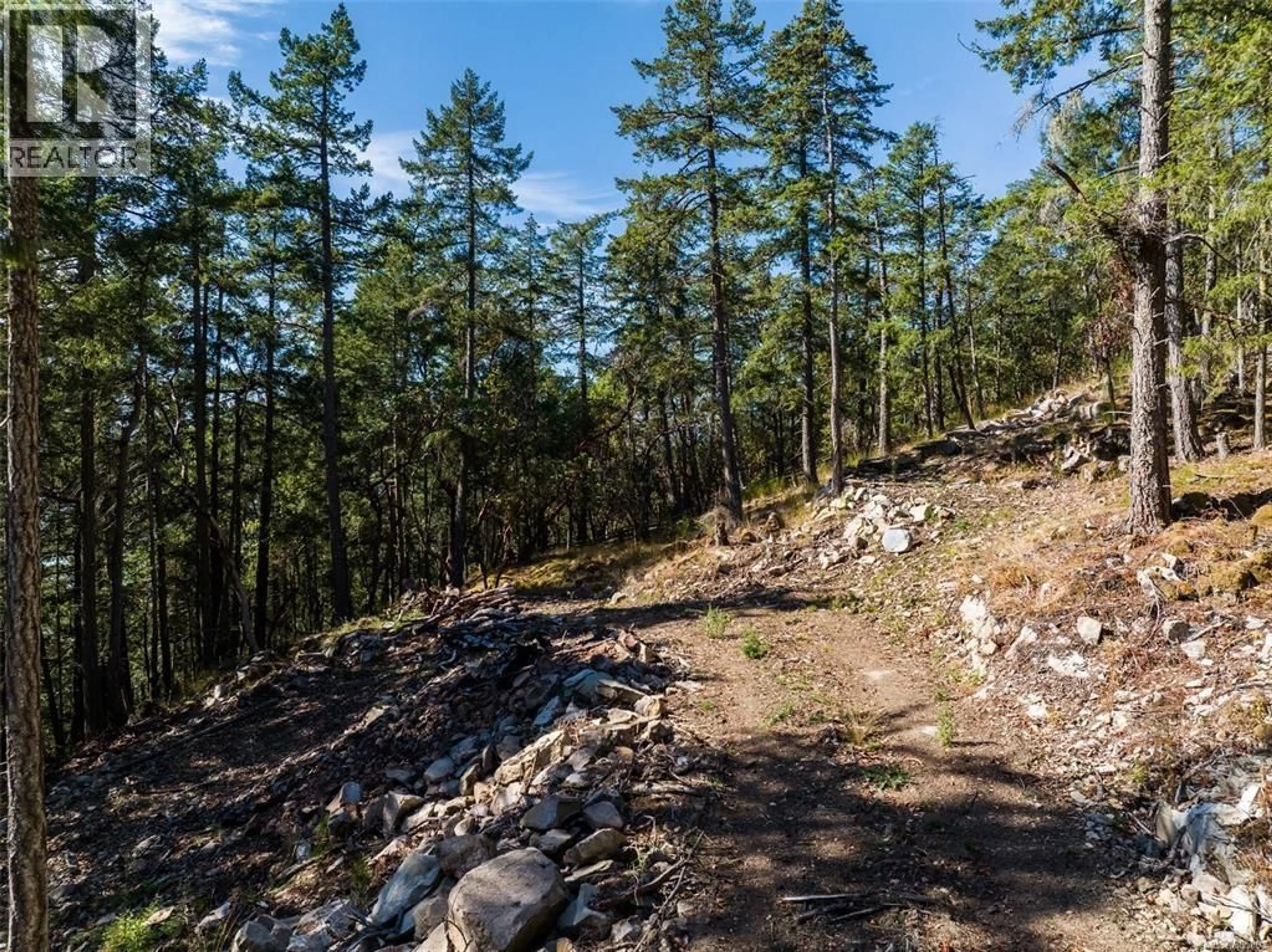 A pic from outside/outdoor area/front of a property/back of a property/a pic from drone, forest/trees view for 400 BAKER ROAD, Salt Spring Island British Columbia V8K2N5
