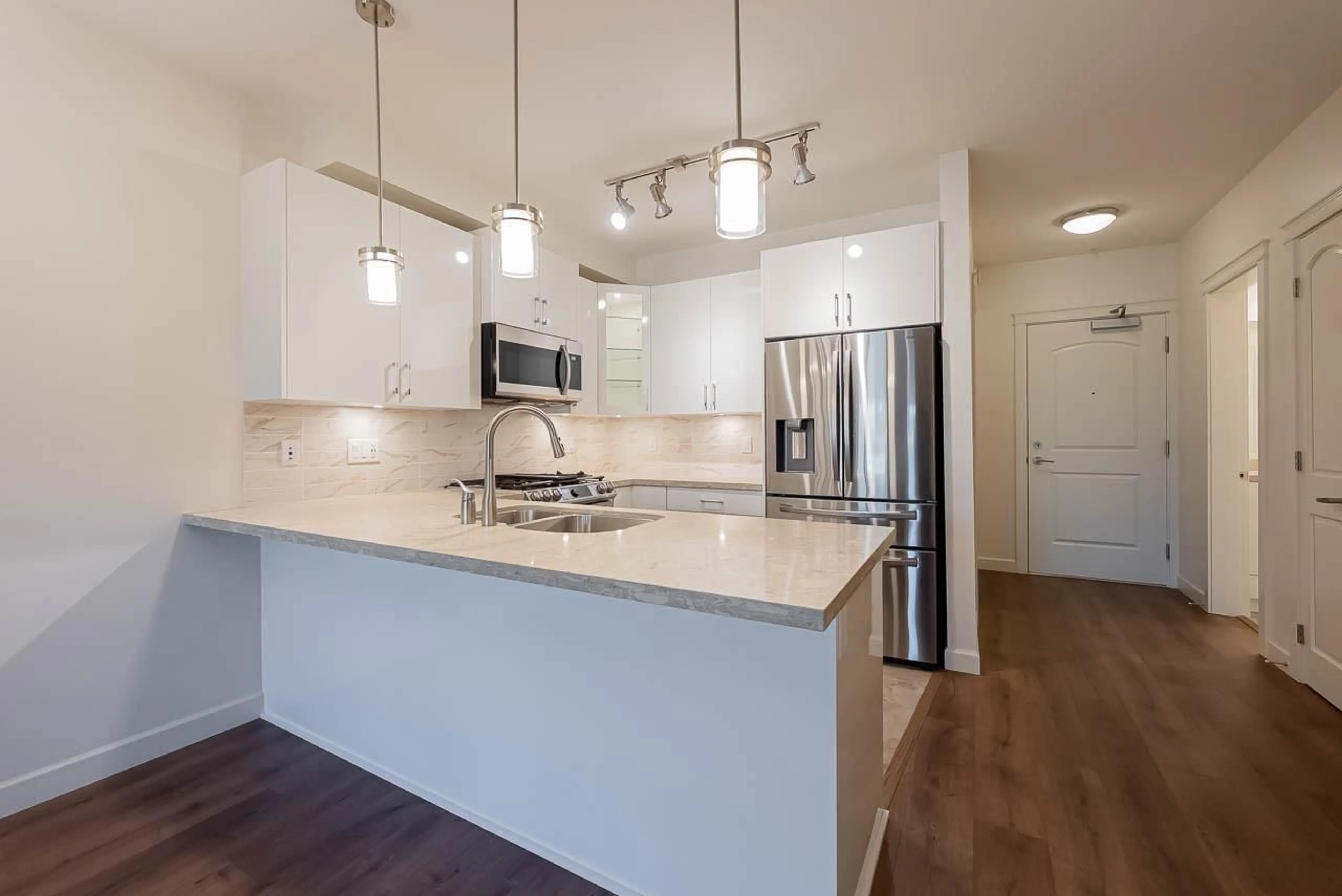 Open concept kitchen, unknown for 406 - 8538 203A STREET, Langley British Columbia V2Y3P9